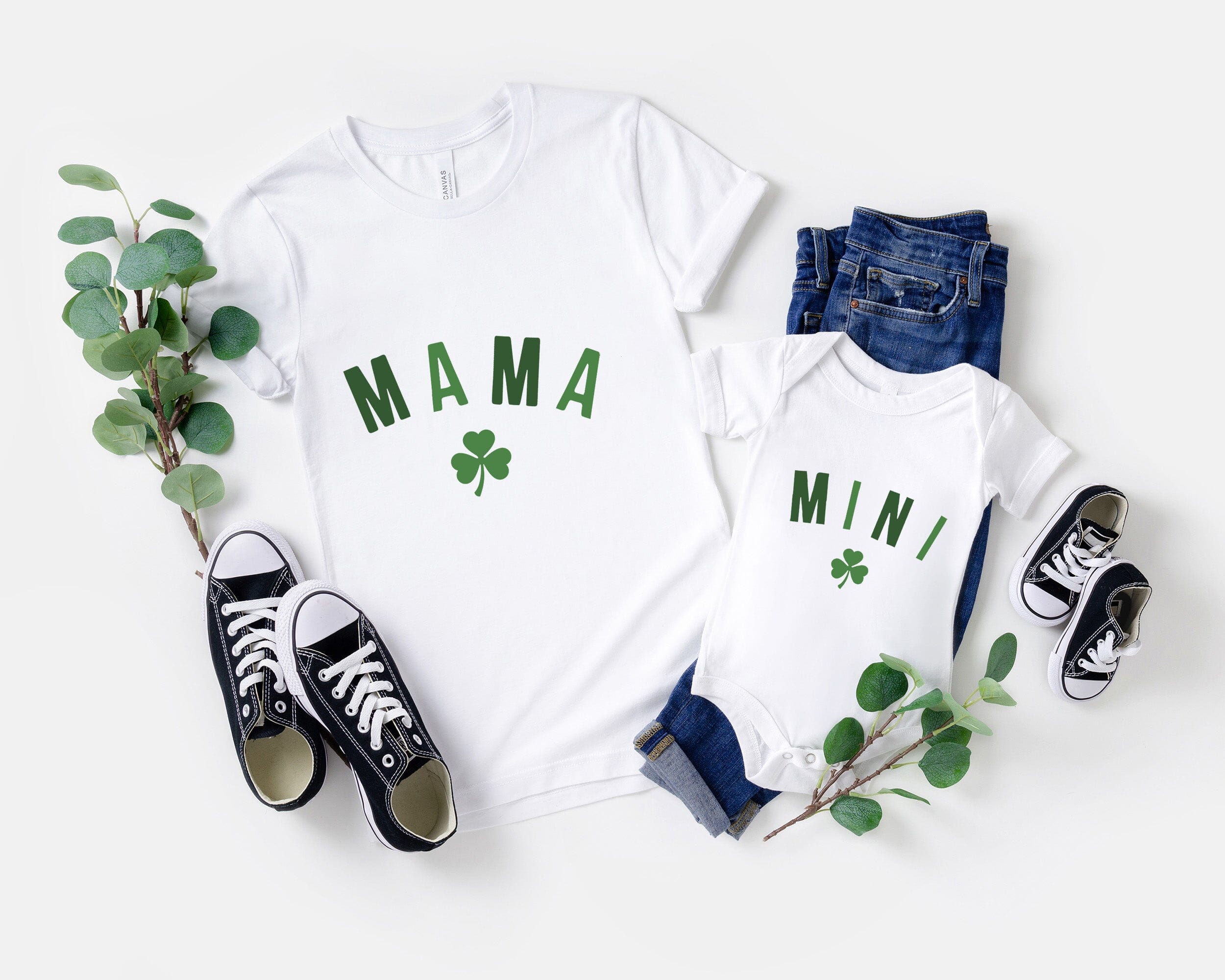 A cute Mini St. Paddy's Onesie featuring a festive design, perfect for babies celebrating St. Patrick's Day.