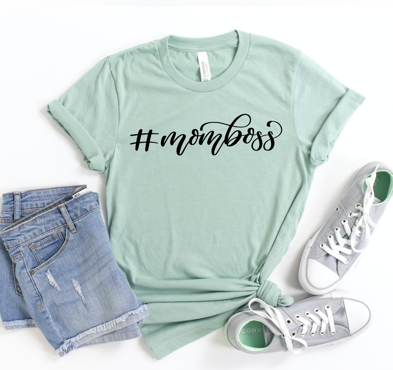 Mom Boss T-shirt in various sizes, showcasing its stylish design and soft fabric.