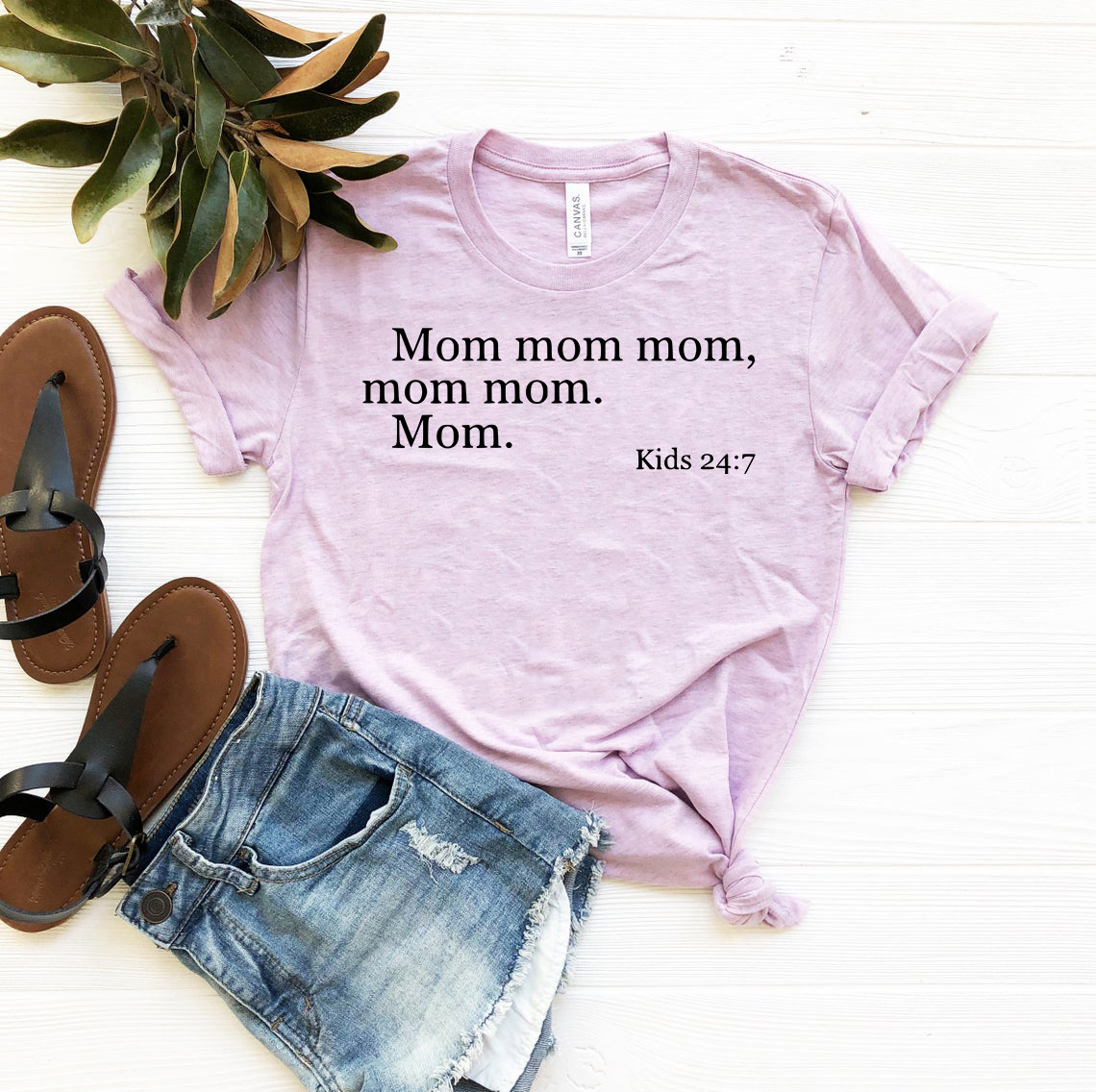 A stylish unisex Mom Shirt made from soft ring spun cotton, available in multiple colors and sizes.