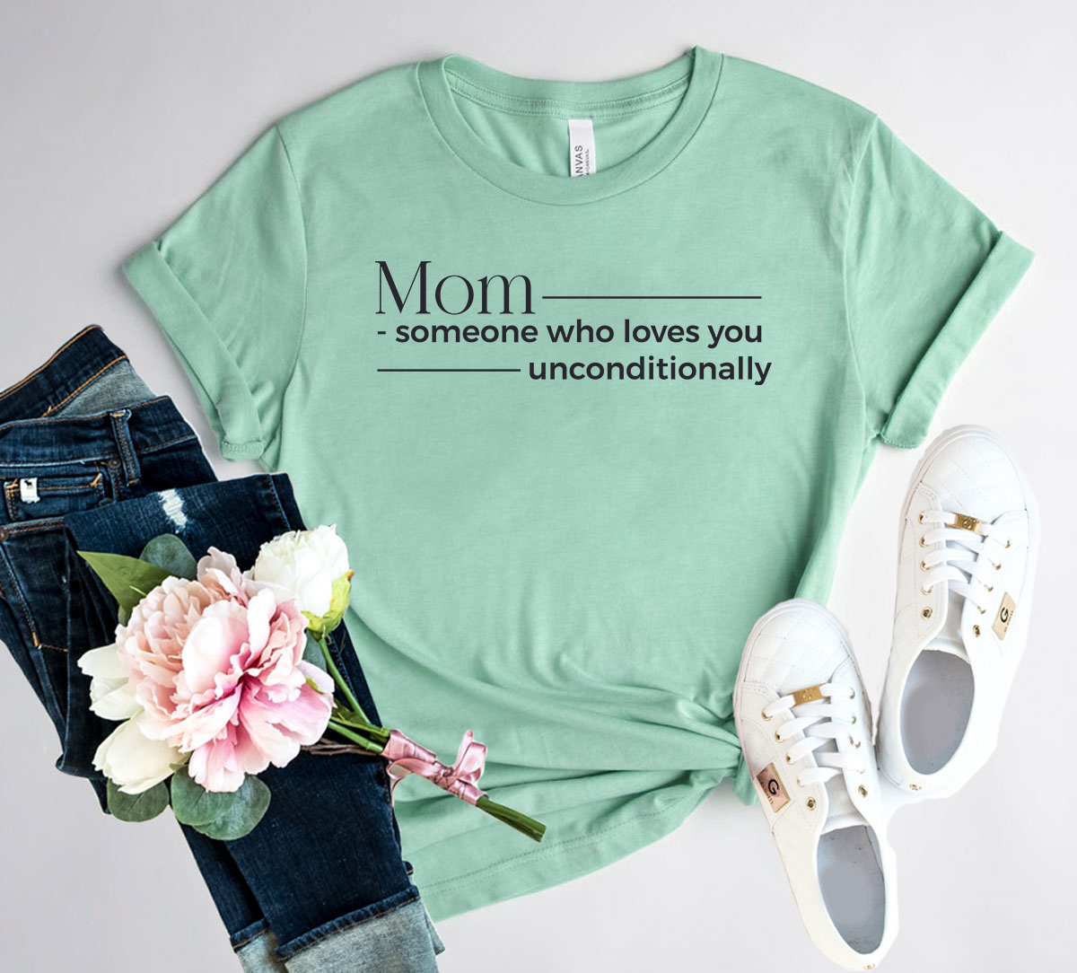 Mom Someone Who Loves Unconditionally Shirt in various colors, showcasing its soft fabric and stylish design.