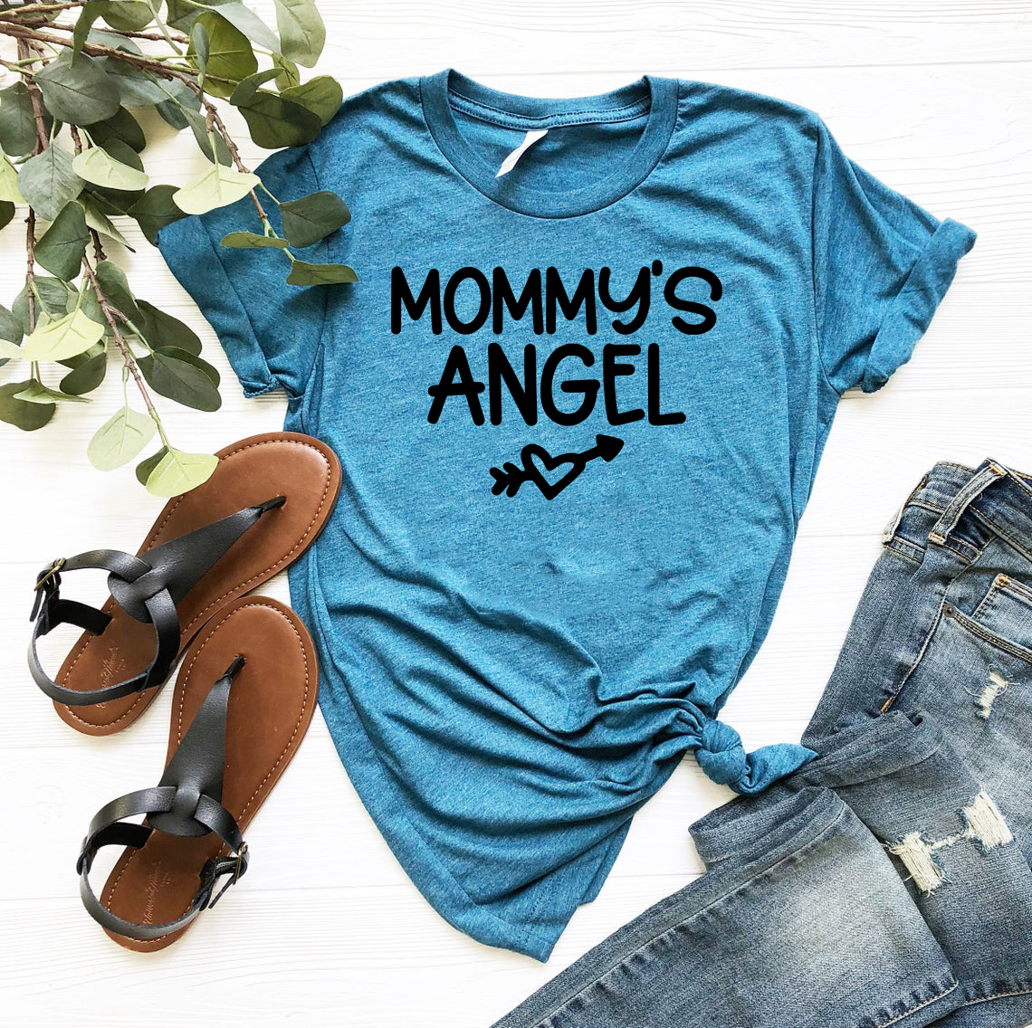 Mommy's Angel Shirt in various colors, showcasing its soft fabric and stylish design.