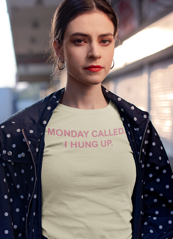 A stylish women’s t-shirt featuring the phrase 'Monday Called I Hung Up', made from soft ringspun cotton, perfect for casual wear.