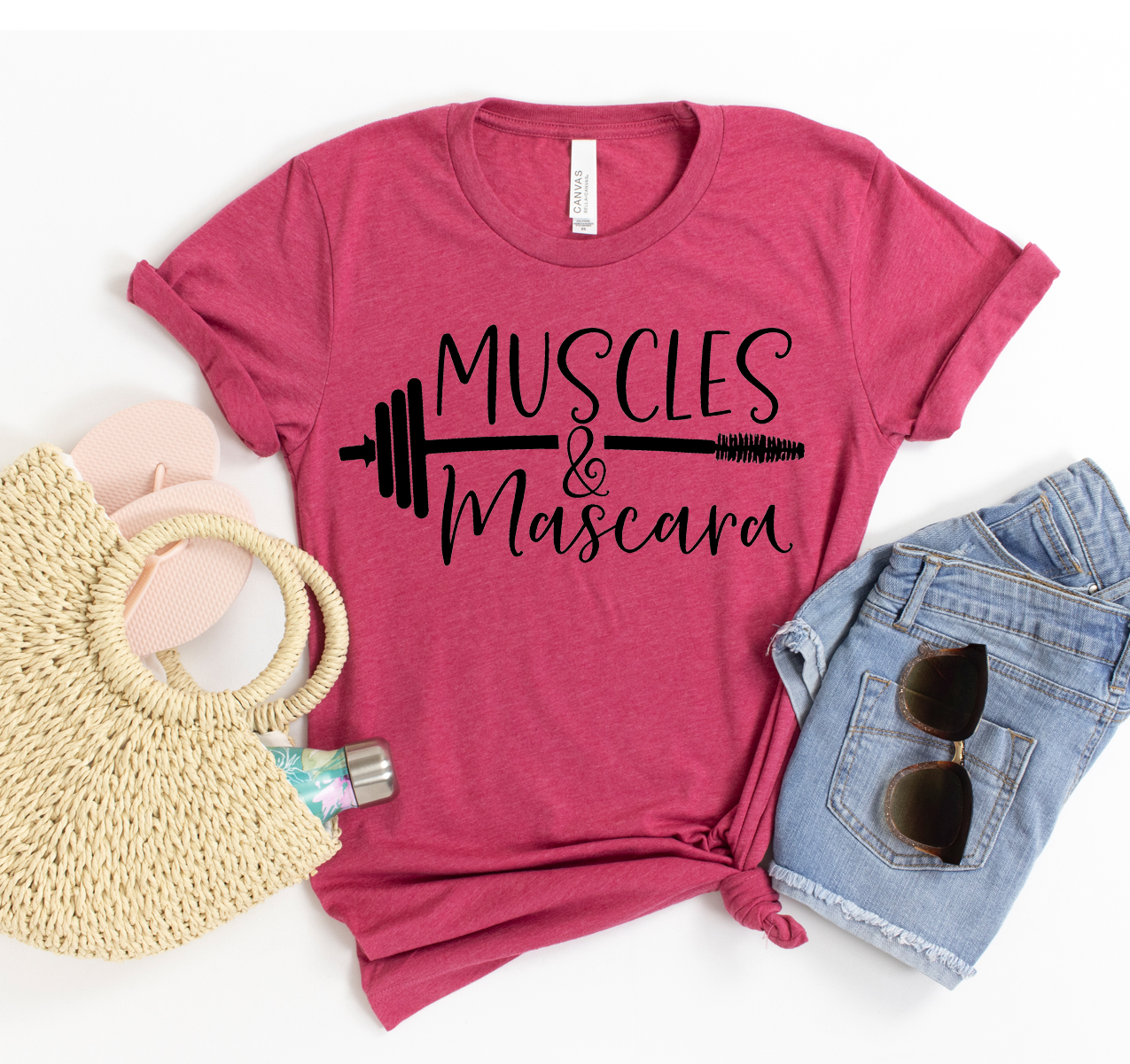 Muscles And Mascara T-shirt displayed on a mannequin, showcasing its unisex design and soft fabric.