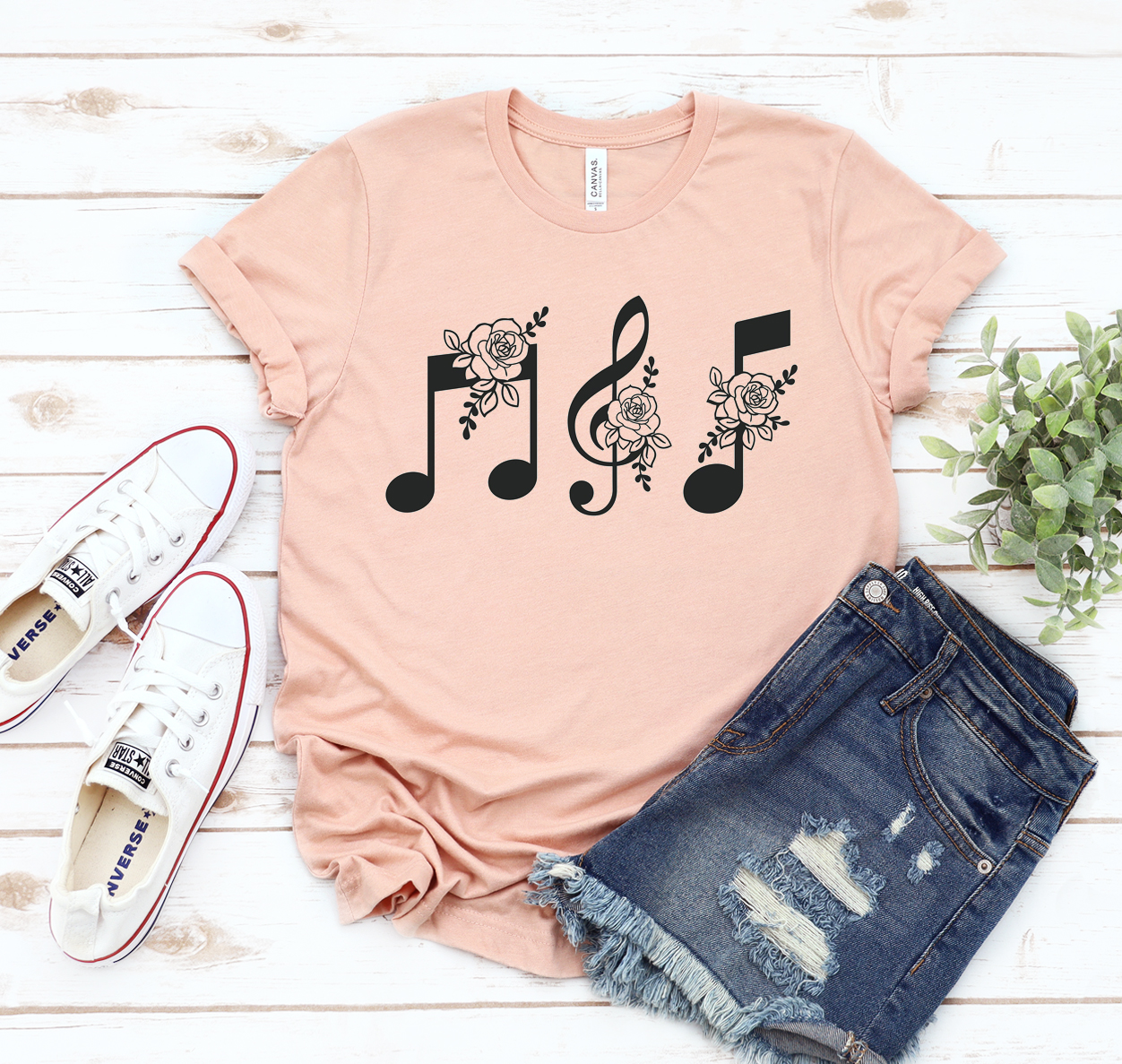 A stylish Music Notes T-shirt featuring musical notes design, made from soft cotton fabric, perfect for music lovers.