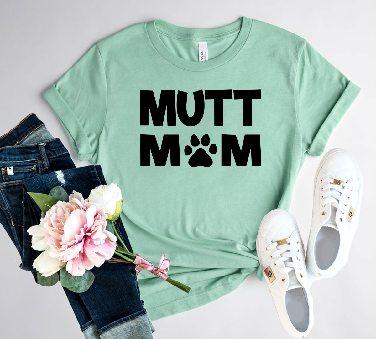 A comfortable unisex Mutt Mom Shirt made from ring spun cotton, featuring a stylish design and available in multiple colors.