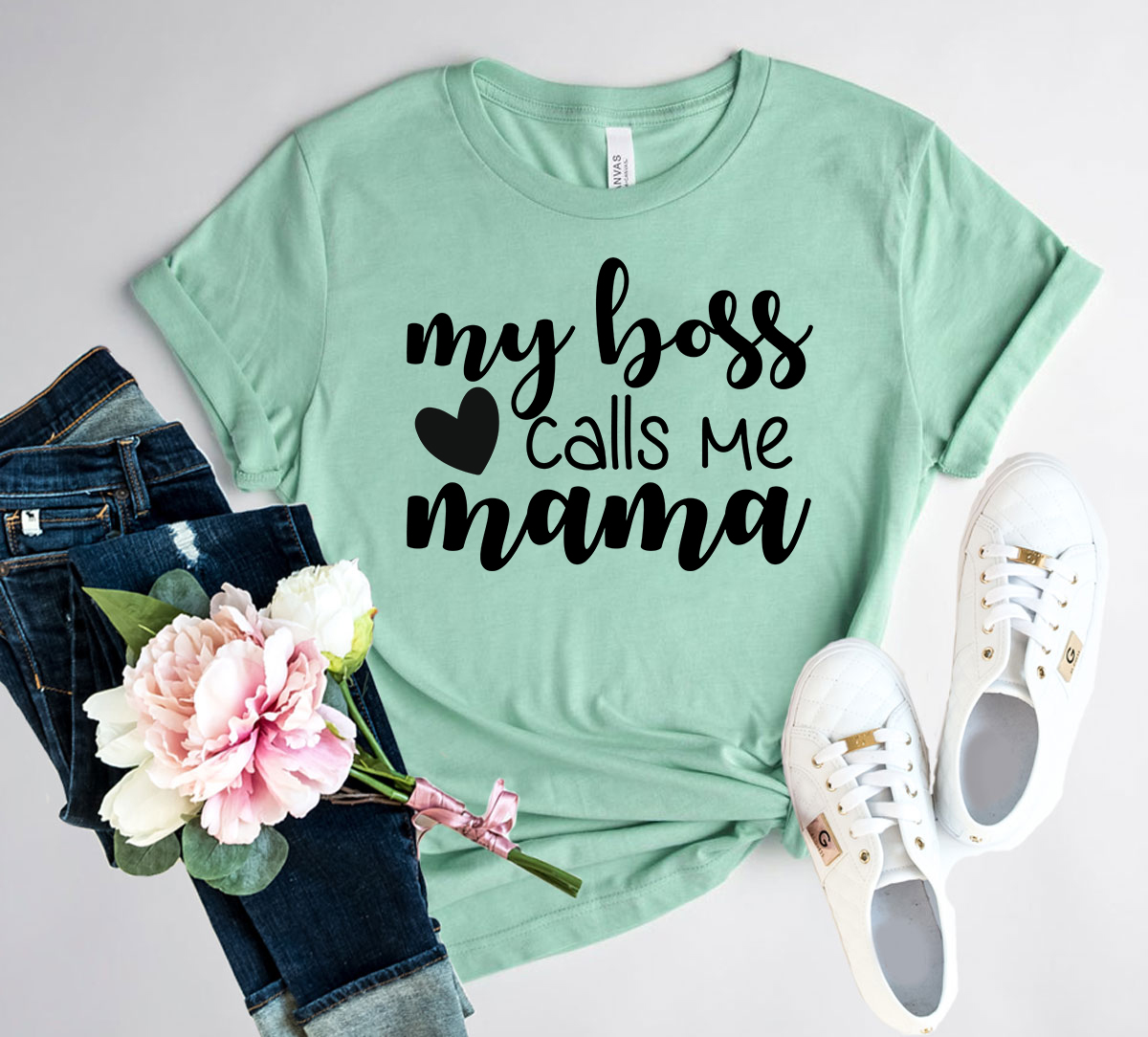 Unisex My Boss Calls Me Mama Shirt in various colors, showcasing its soft fabric and stylish design.