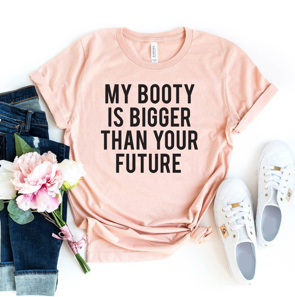 My Booty Is Bigger Than Your Future T-shirt in various sizes, showcasing its premium quality and stylish design.