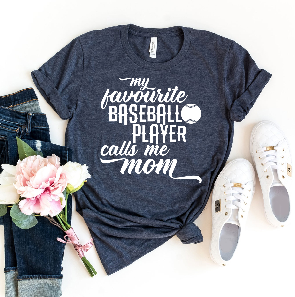 My Favorite Baseball Player Calls Me Mom T-shirt in various sizes, showcasing its soft cotton fabric and vibrant print.