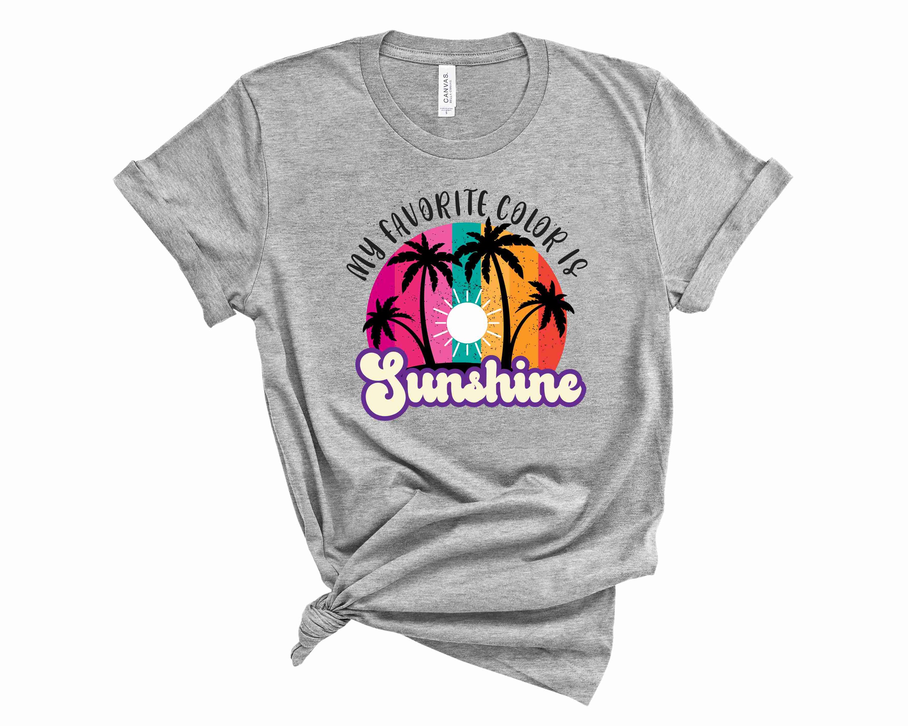 A vibrant unisex graphic tee featuring the phrase 'My Favorite Color is Sunshine' in bright colors, perfect for casual wear.