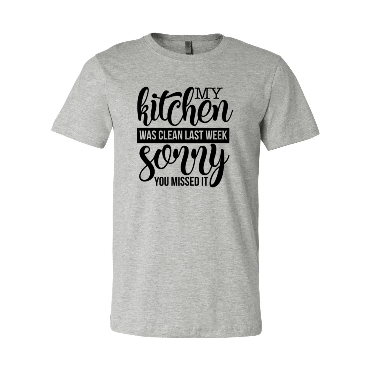 Unisex T-shirt featuring the phrase 'My Kitchen Was Clean Last Week Sorry' in a stylish design, made from soft ring spun cotton.