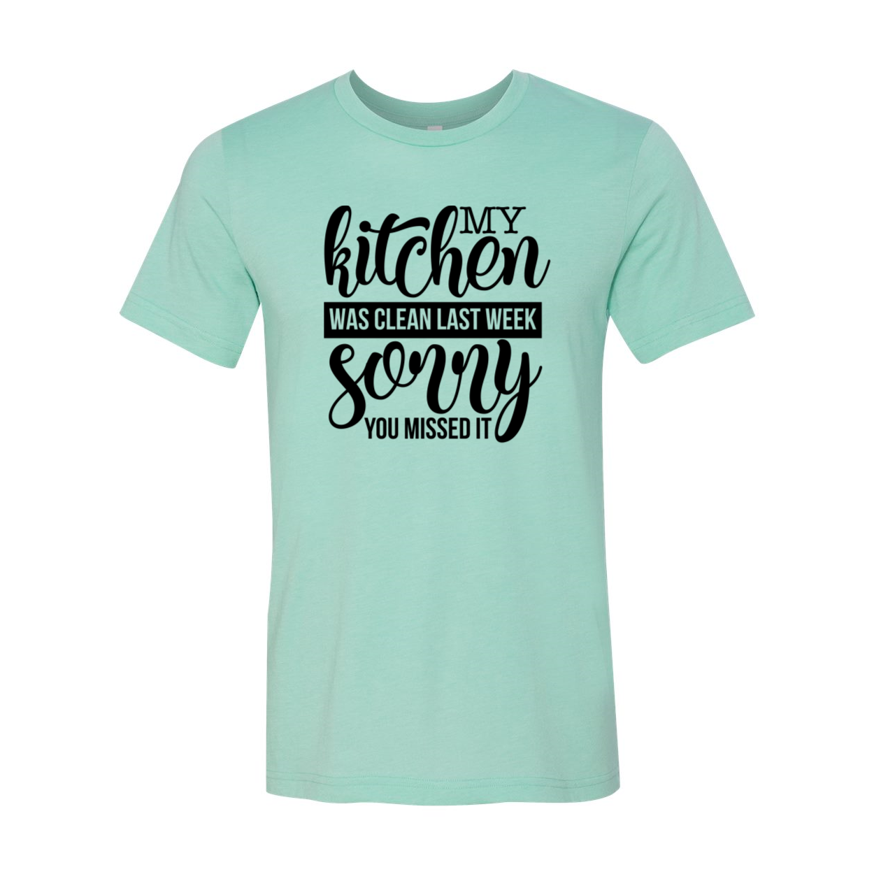 Unisex T-shirt featuring the phrase 'My Kitchen Was Clean Last Week Sorry' in a stylish design, made from soft ring spun cotton.