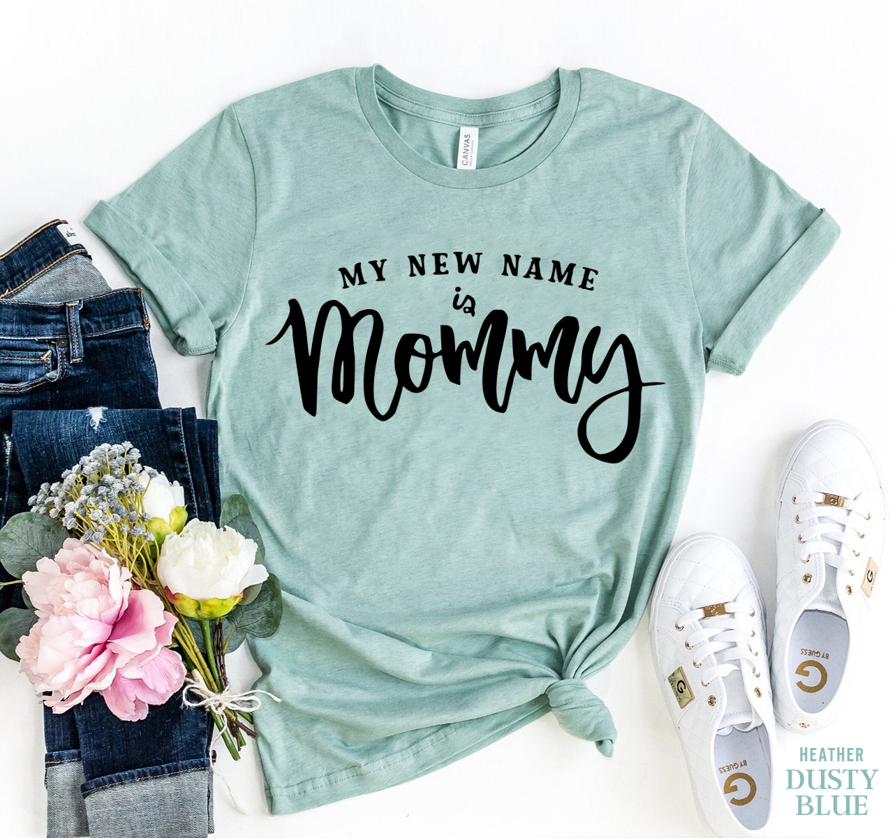 A soft, premium quality T-shirt with the text 'My New Name Is Mommy' printed in a stylish design, available in various sizes.