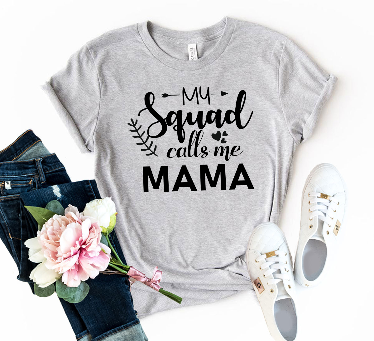 Unisex T-shirt featuring the phrase 'My Squad Calls Me Mama' in vibrant colors, made from soft ring spun cotton.