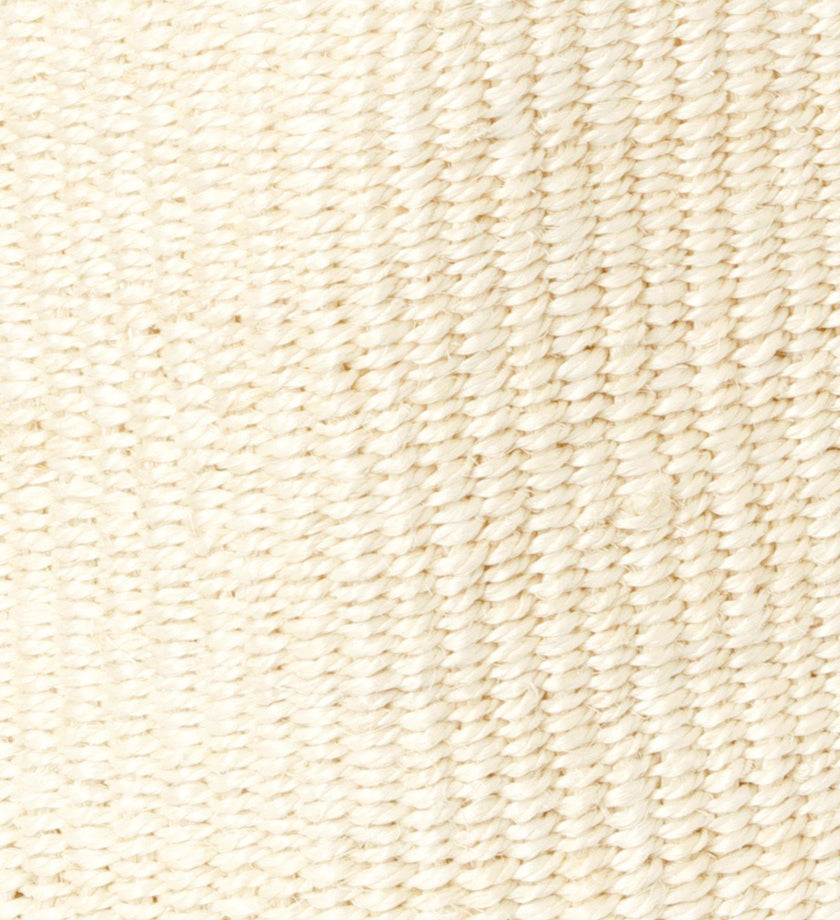 Handwoven natural sisal and fibre African floor storage baskets in cream color, showcasing their unique handcrafted design and durability.