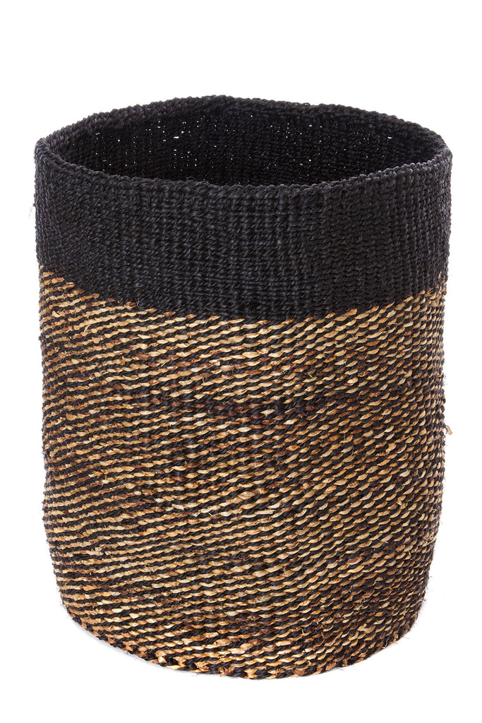 Handwoven natural sisal and fibre African floor storage baskets in cream color, showcasing their unique handcrafted design and durability.