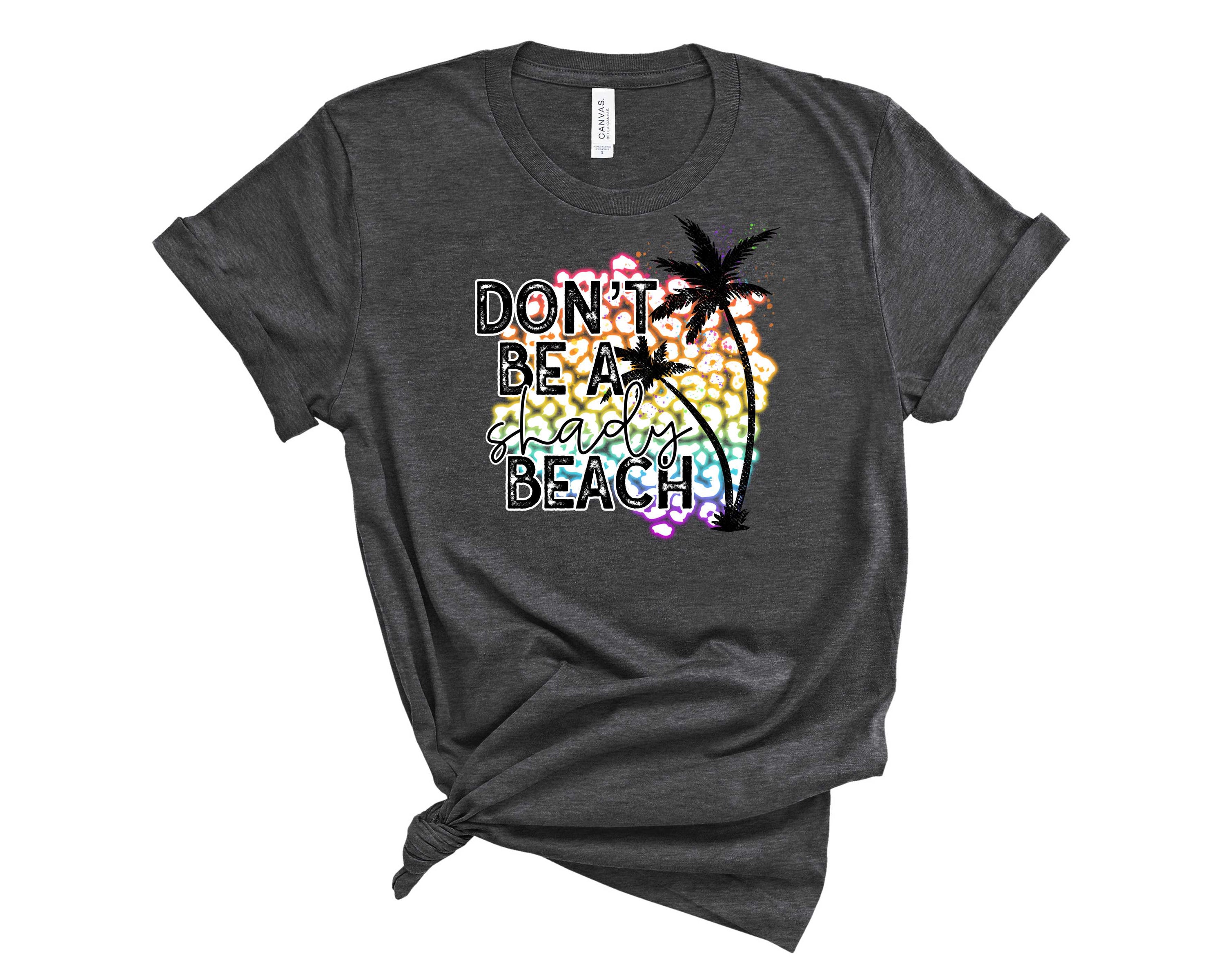 Neon Shady Beach Graphic Tee featuring vibrant colors and a stylish design, perfect for summer wear.