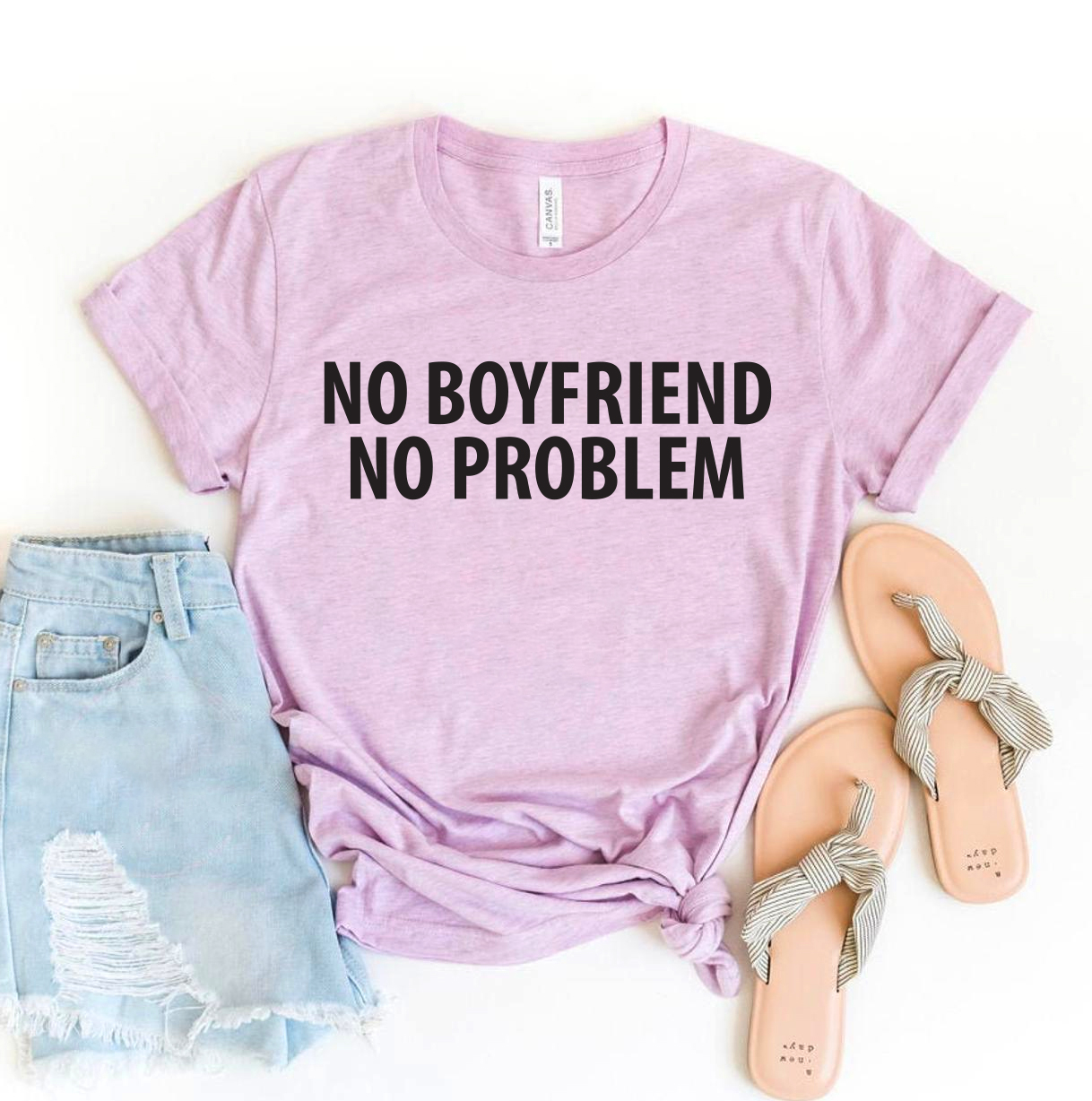 No Boyfriend No Problem T-shirt made from premium ring spun cotton, featuring a bold print design and available in various sizes.