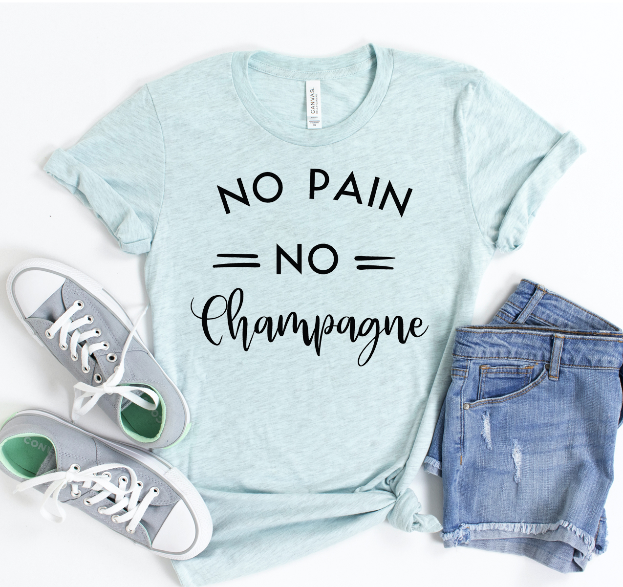 A stylish No Pain No Champagne T-shirt displayed on a mannequin, showcasing its unisex design and soft fabric.