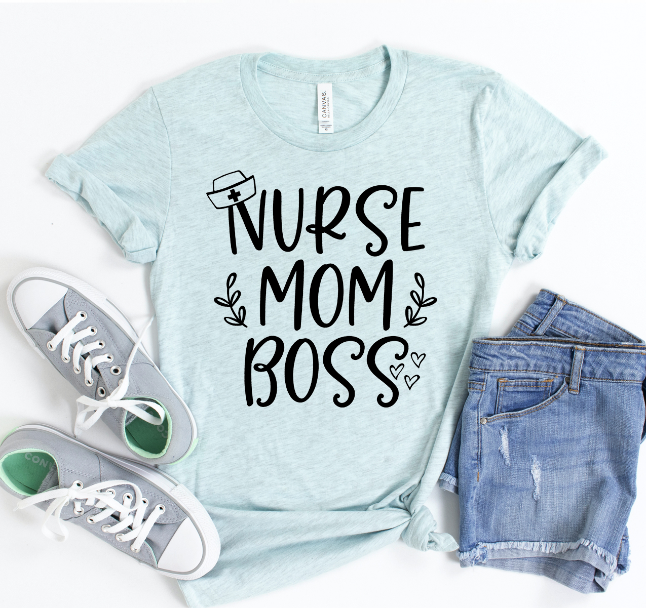 Nurse Mom Boss T-shirt featuring a bold graphic design, made from soft cotton fabric, available in various sizes.