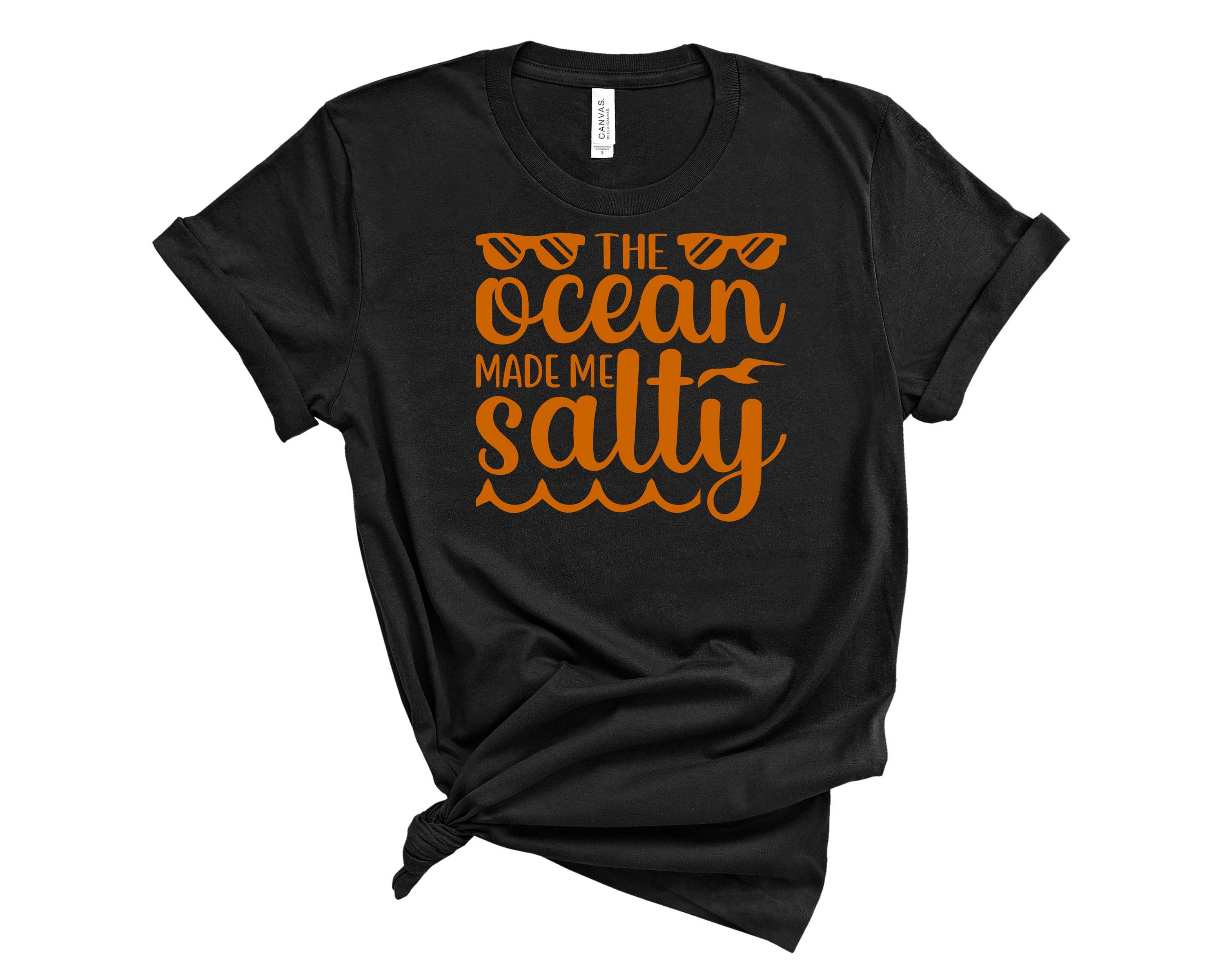 Ocean Made Me Salty graphic tee featuring a vibrant ocean-themed design on a soft unisex t-shirt.