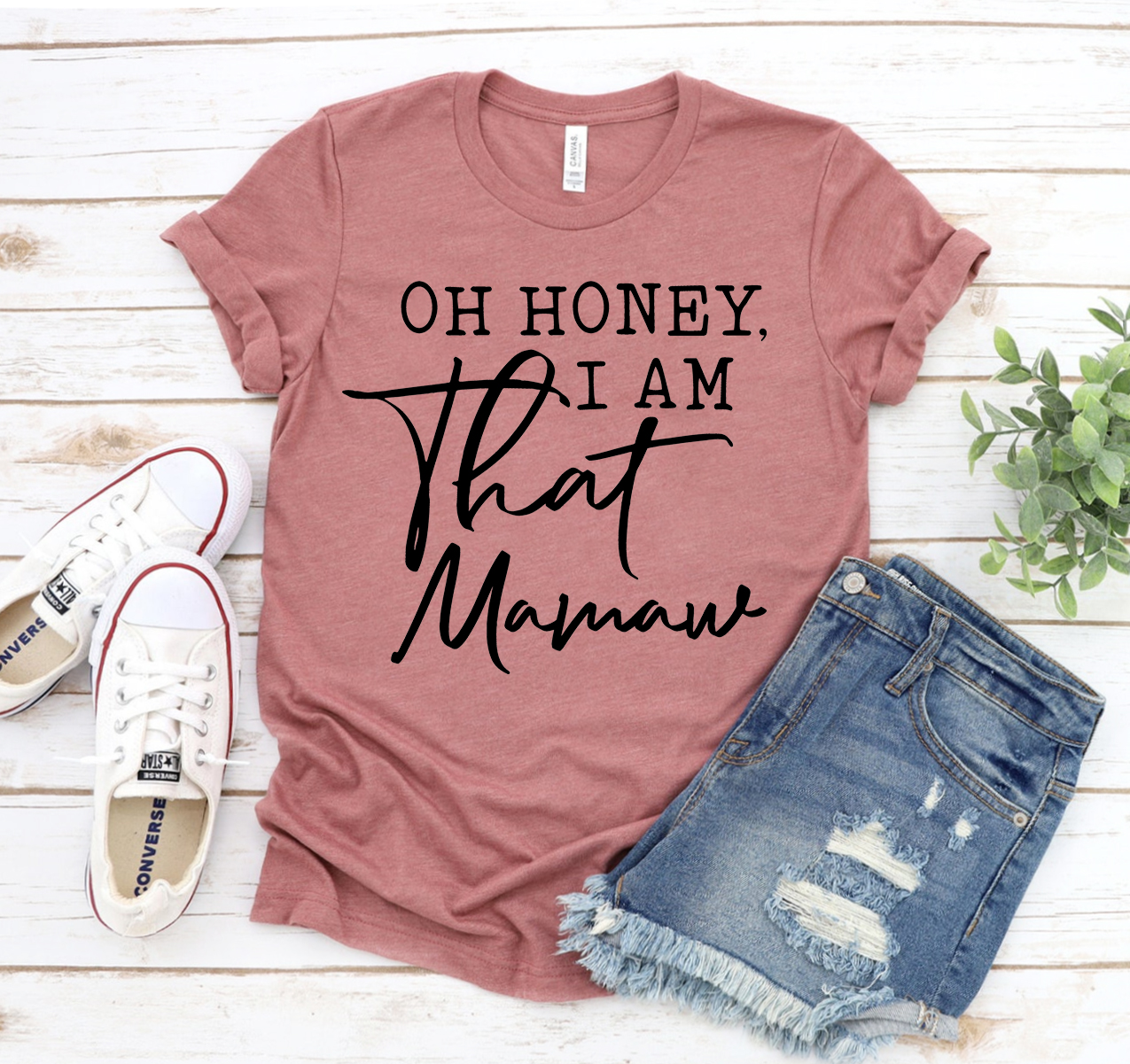 Oh Honey I Am That Mawmaw T-shirt displayed on a mannequin, showcasing its soft fabric and playful design.