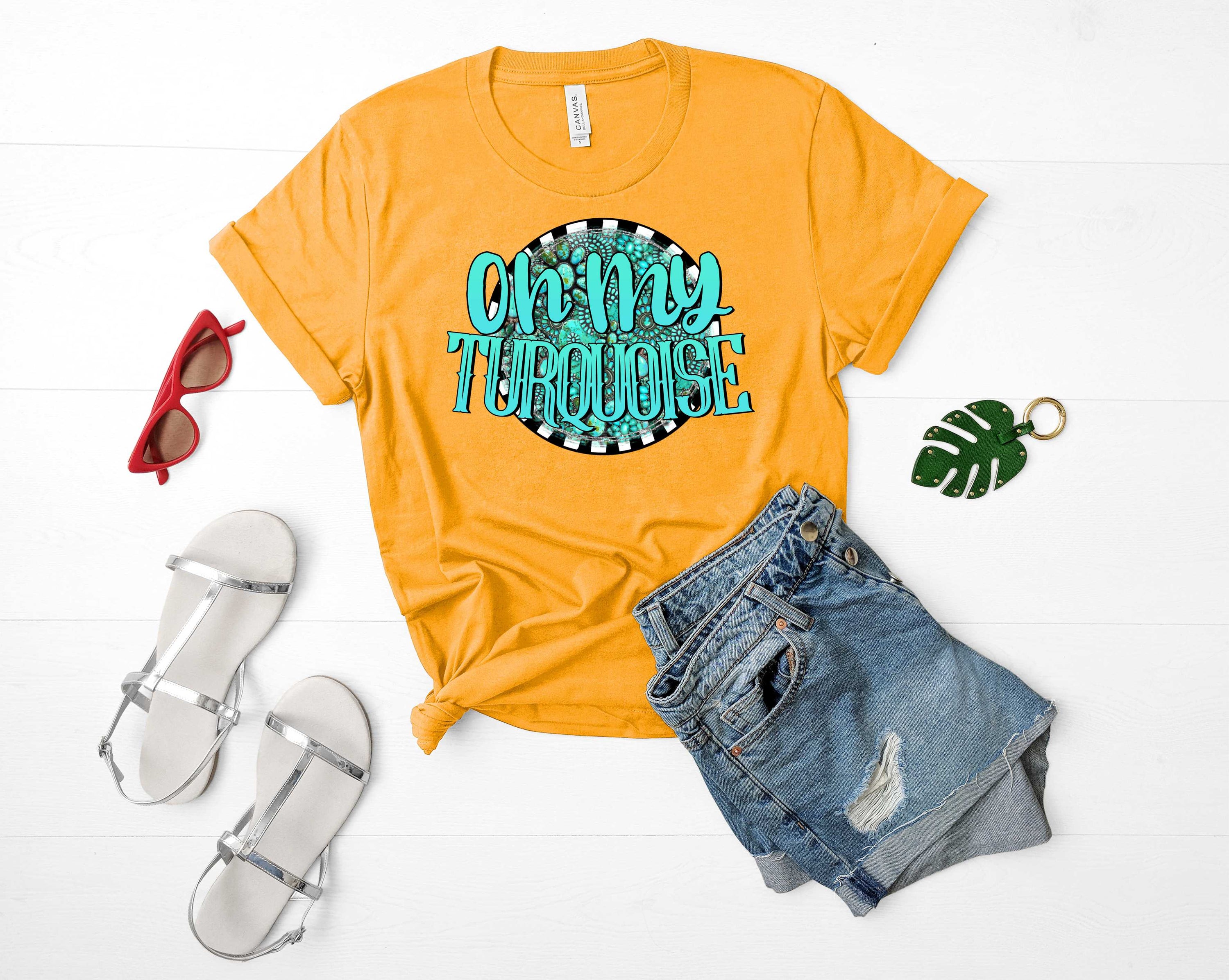 Oh My Turquoise Graphic Tee featuring a vibrant turquoise color and stylish design, suitable for both men and women.