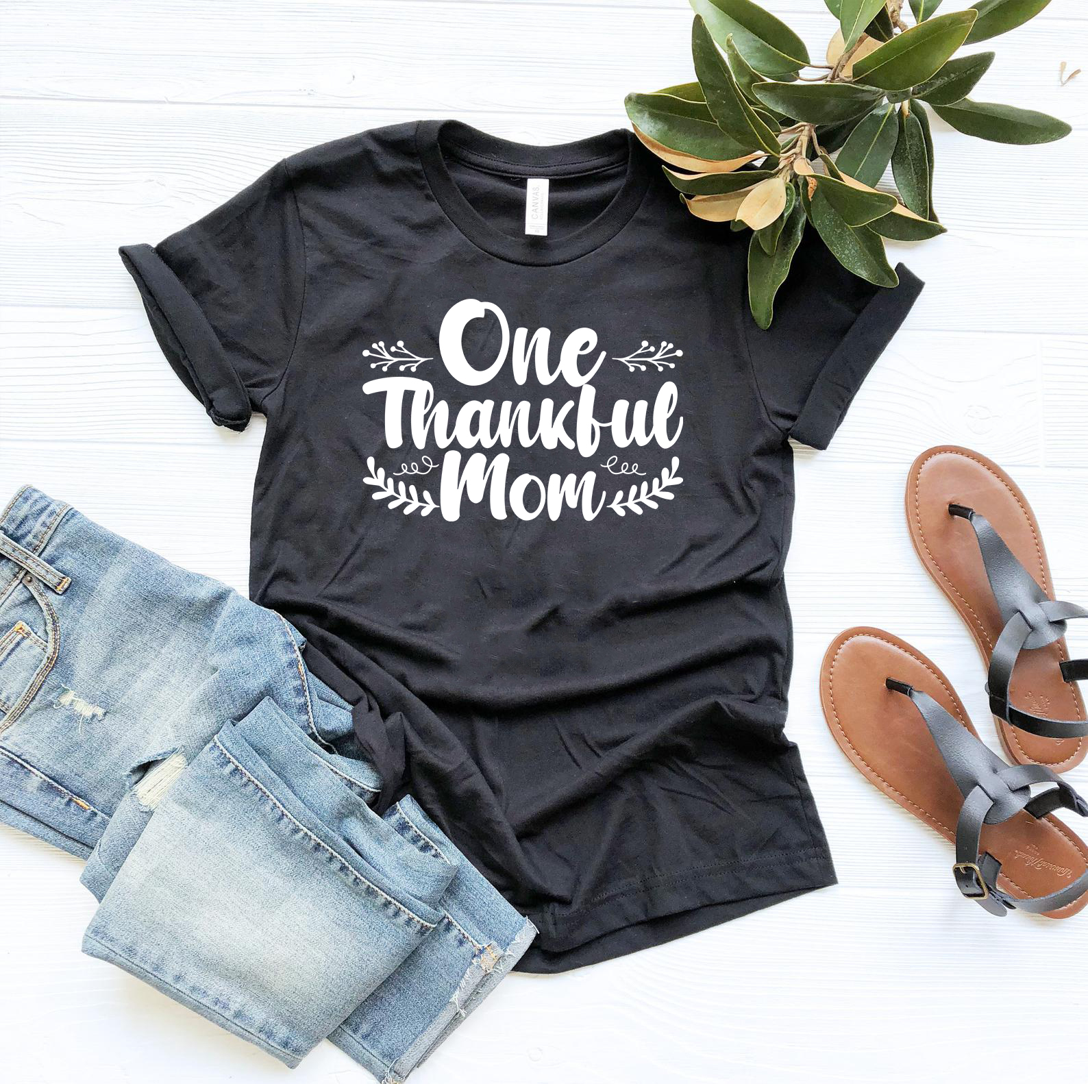 One Thankful Mom Shirt in various colors, showcasing its soft fabric and unisex design.