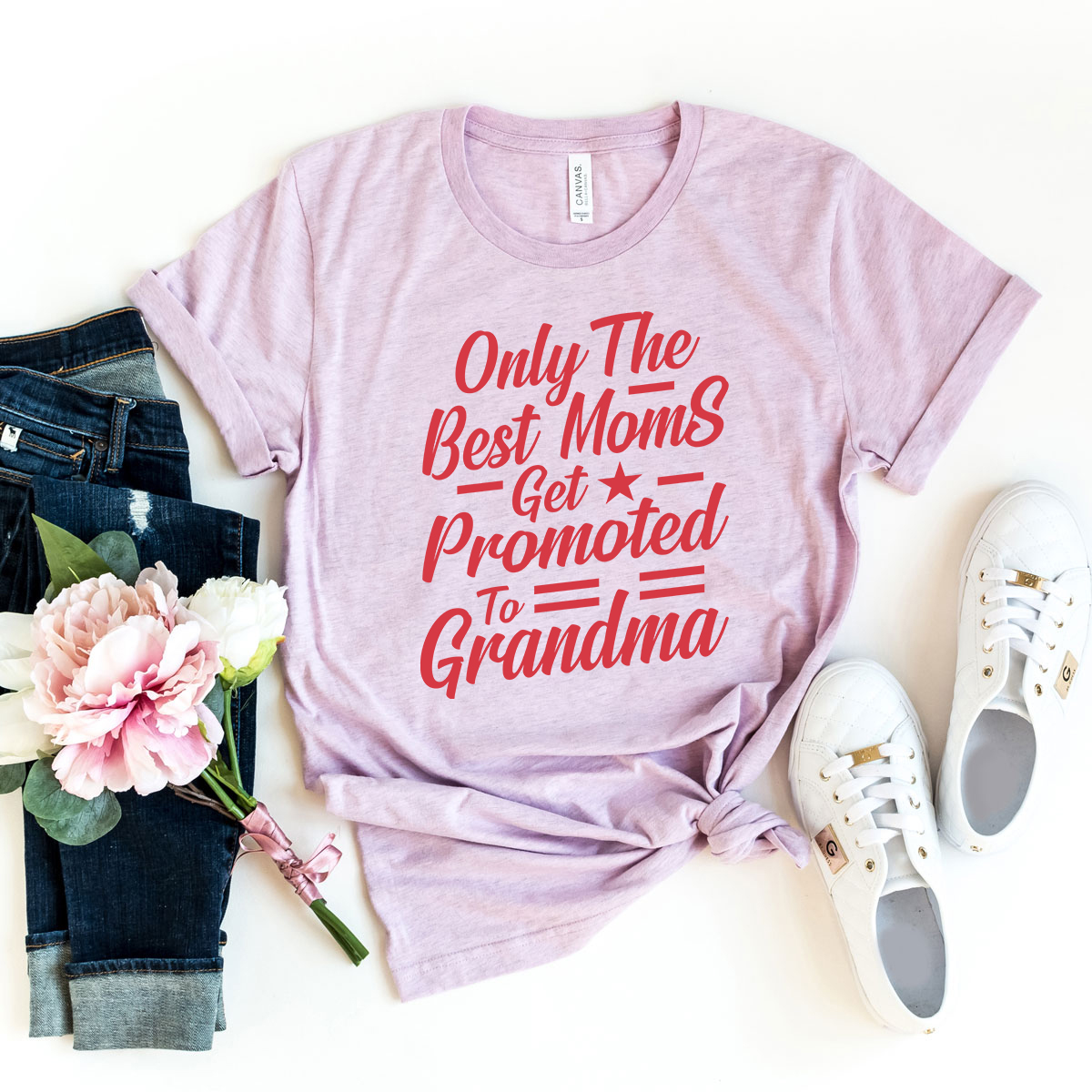 Unisex T-shirt featuring the phrase 'Only The Best Moms Get Promoted To Grandma' in vibrant print, made from soft ring spun cotton.