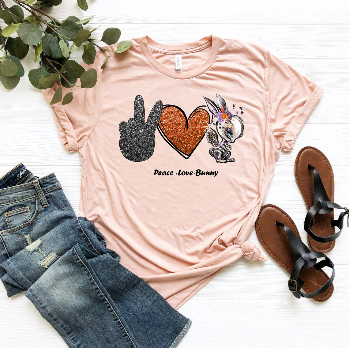 A stylish unisex Peace Love Bunny Shirt made from soft ring spun cotton, available in various colors and sizes.