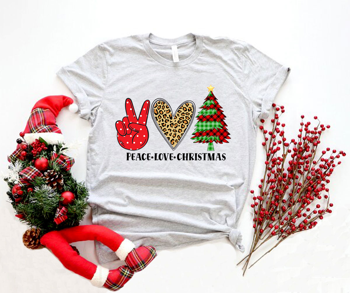 A vibrant unisex Peace Love Christmas Shirt made from soft ring spun cotton, featuring a classic crew neck and available in multiple colors.