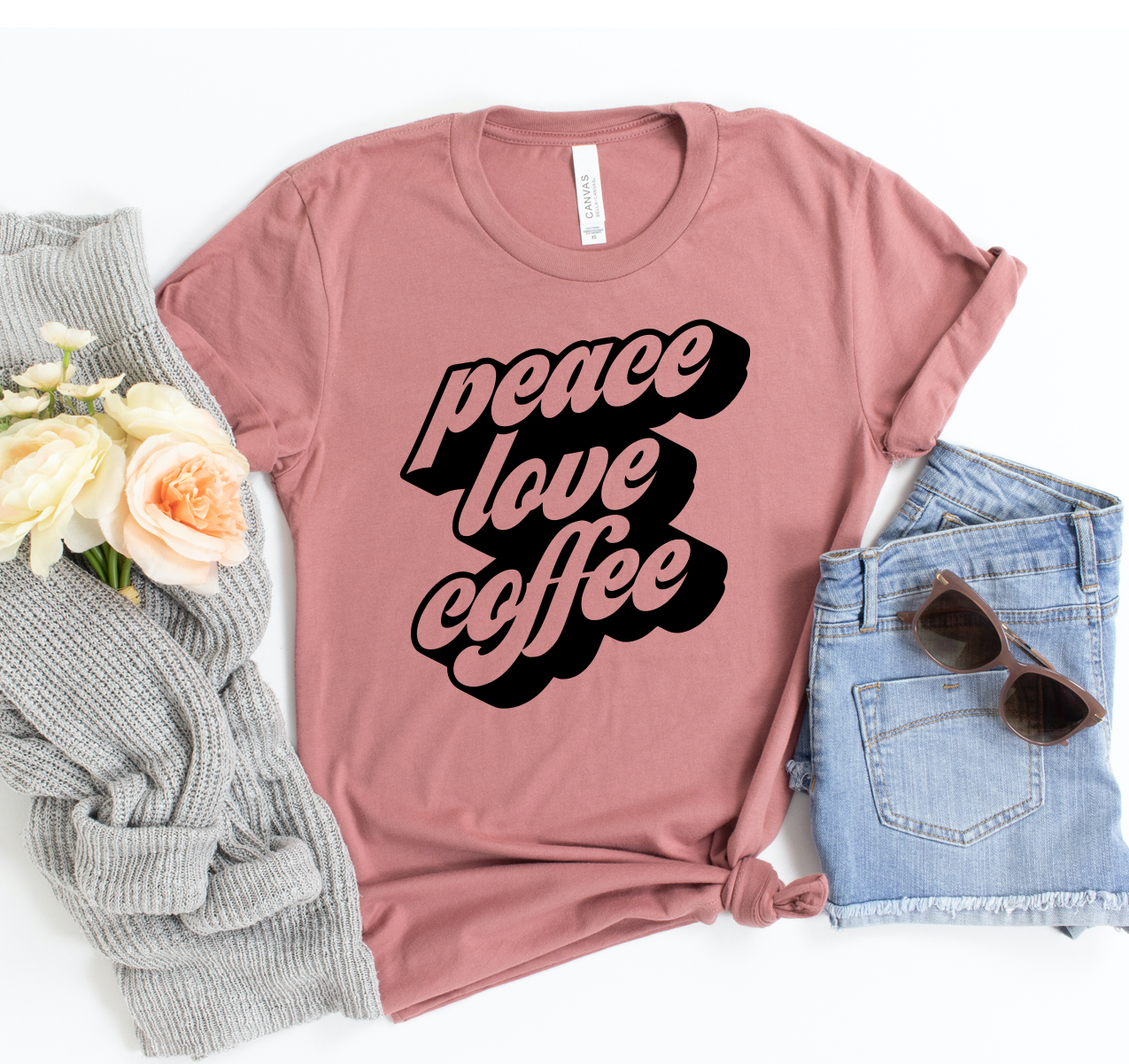 A stylish unisex Peace Love Coffee T-shirt made from soft cotton, featuring a vibrant coffee-themed design.