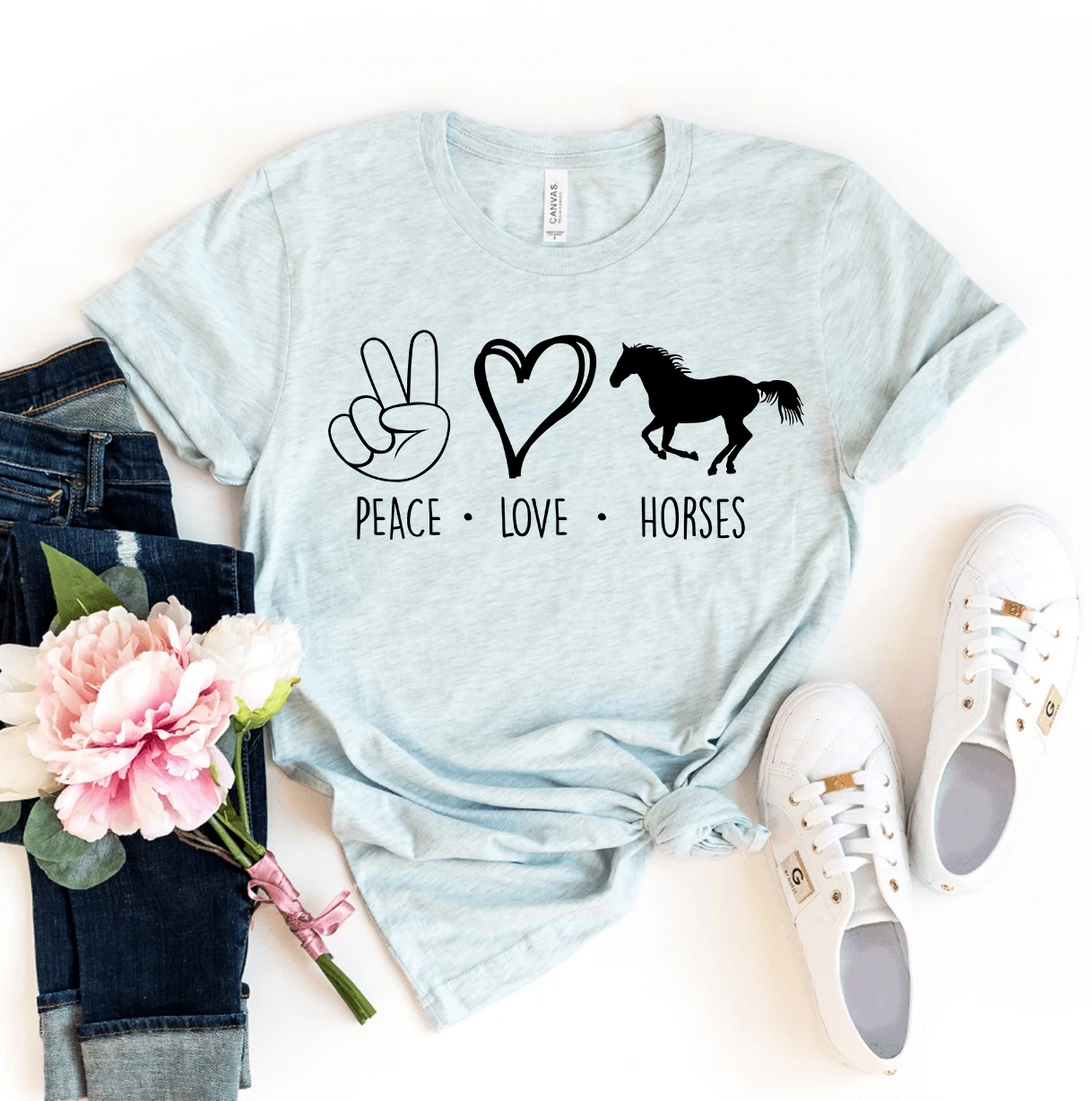 Peace Love Horses T-shirt made of premium ring spun cotton with a vibrant design, available in various sizes.