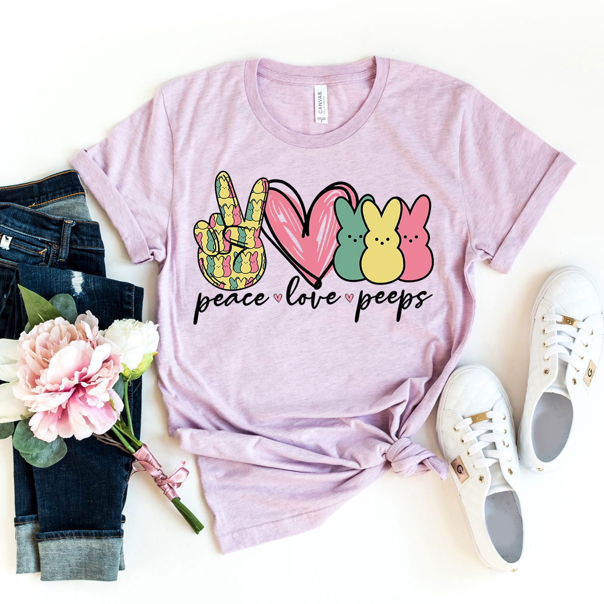 A stylish unisex T-shirt featuring the Peace Love Peeps design, made from soft ring spun cotton, available in various colors.