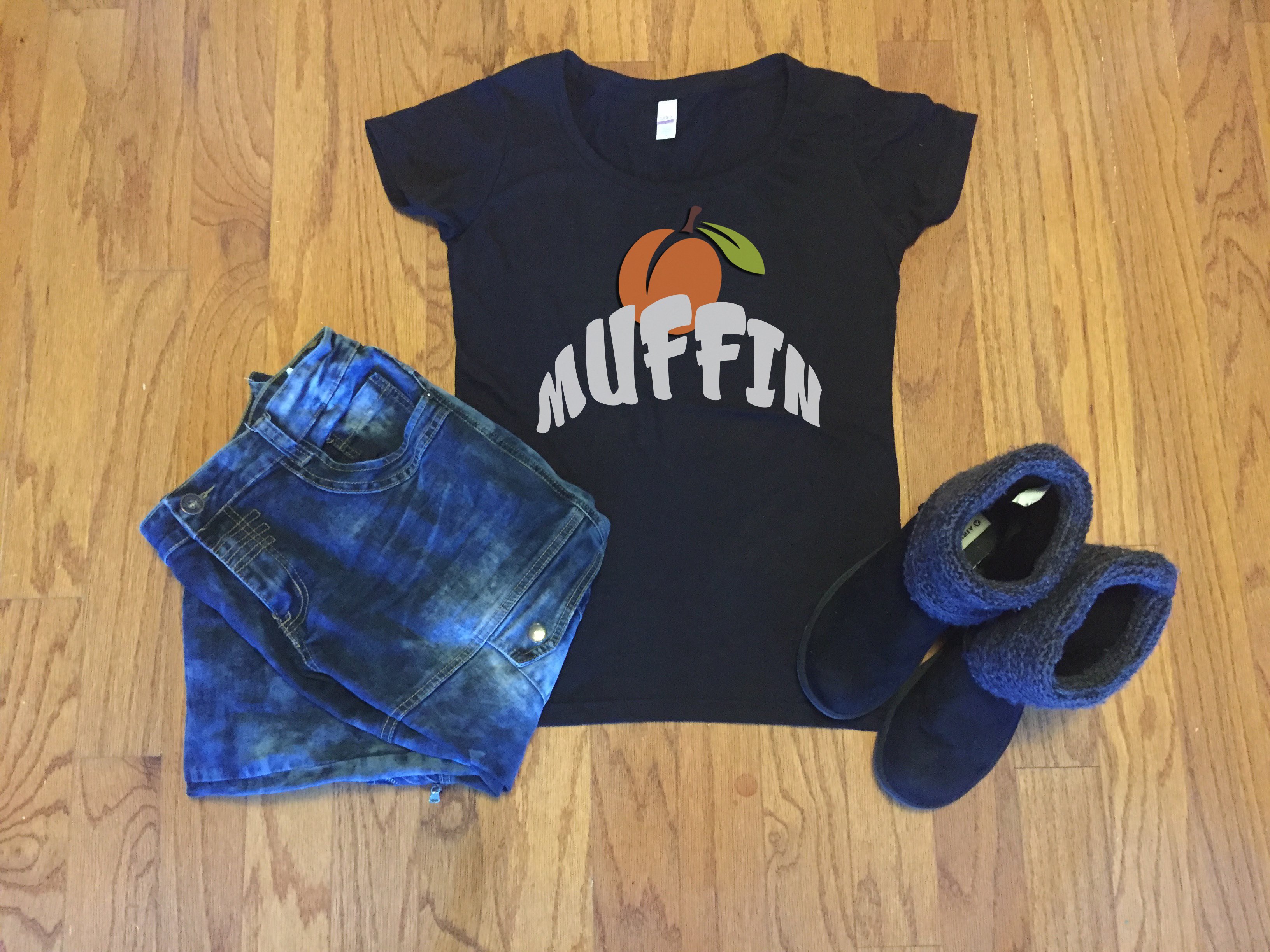 A stylish Peach Muffin t-shirt featuring a playful design, made from soft jersey knit fabric, perfect for casual wear.