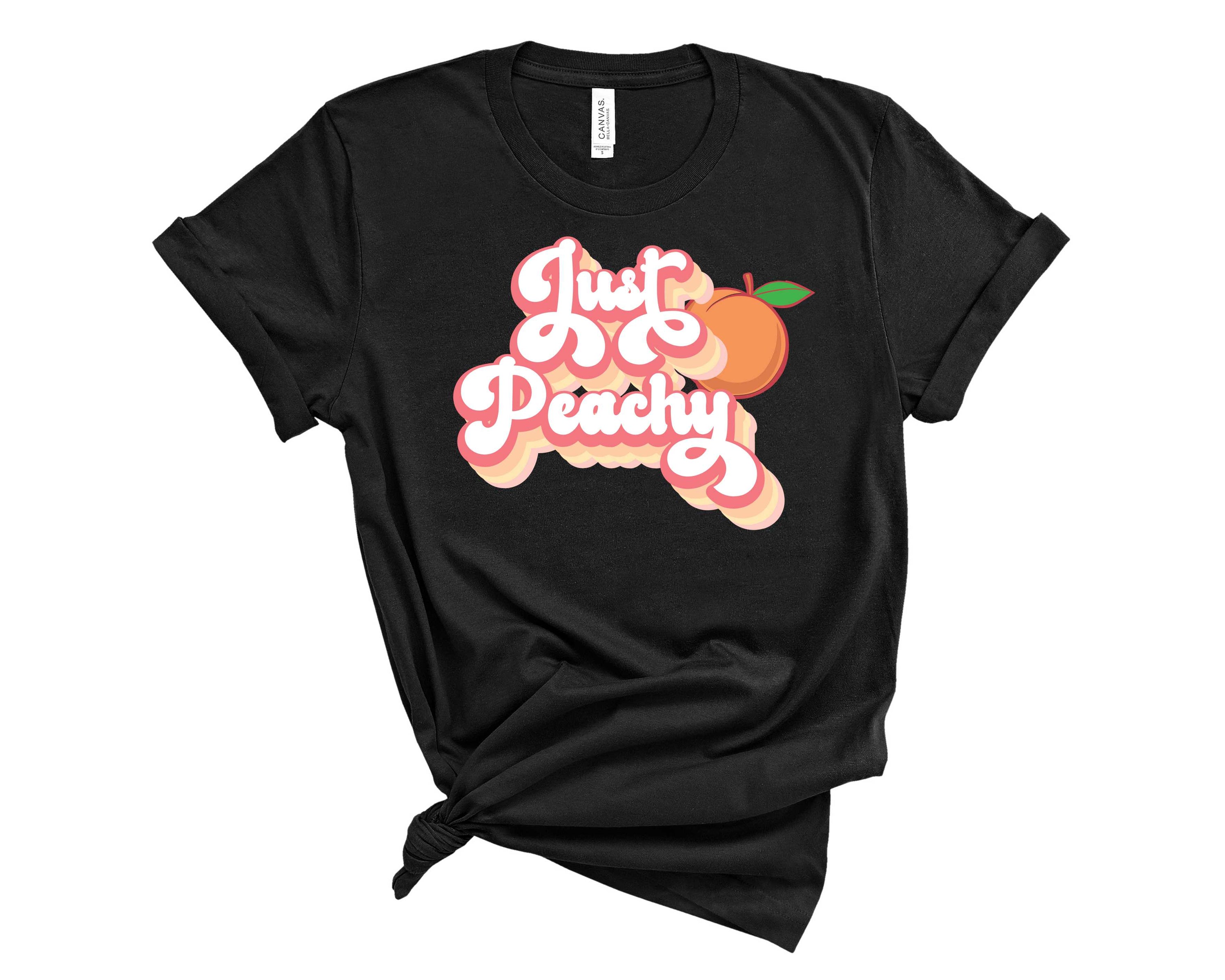 Peachy Graphic Tee featuring a trendy design, perfect for casual wear.