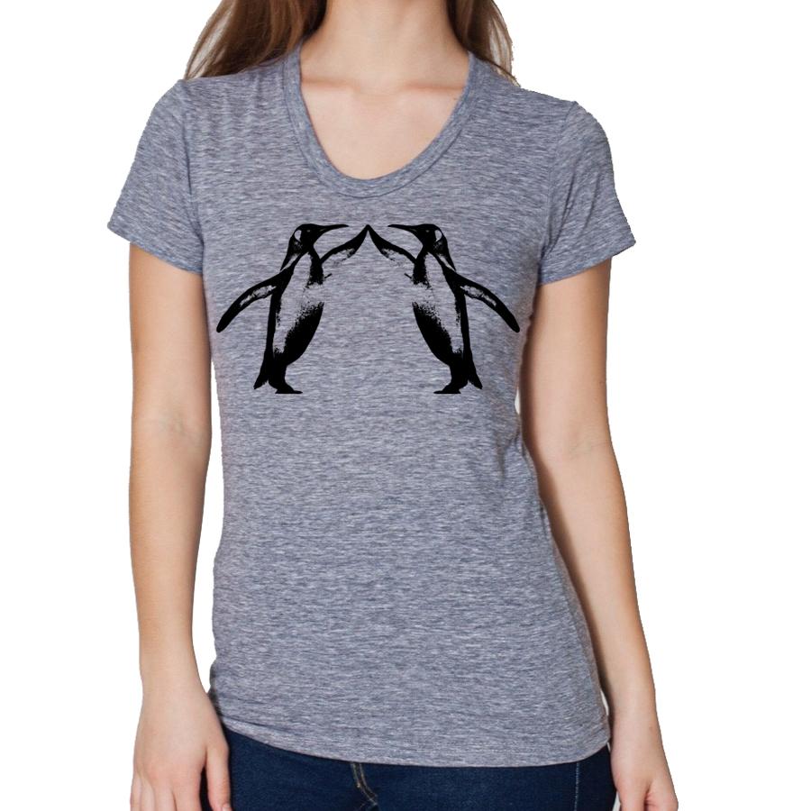 A playful t-shirt featuring a cute penguin graphic giving a high five, perfect for animal lovers.