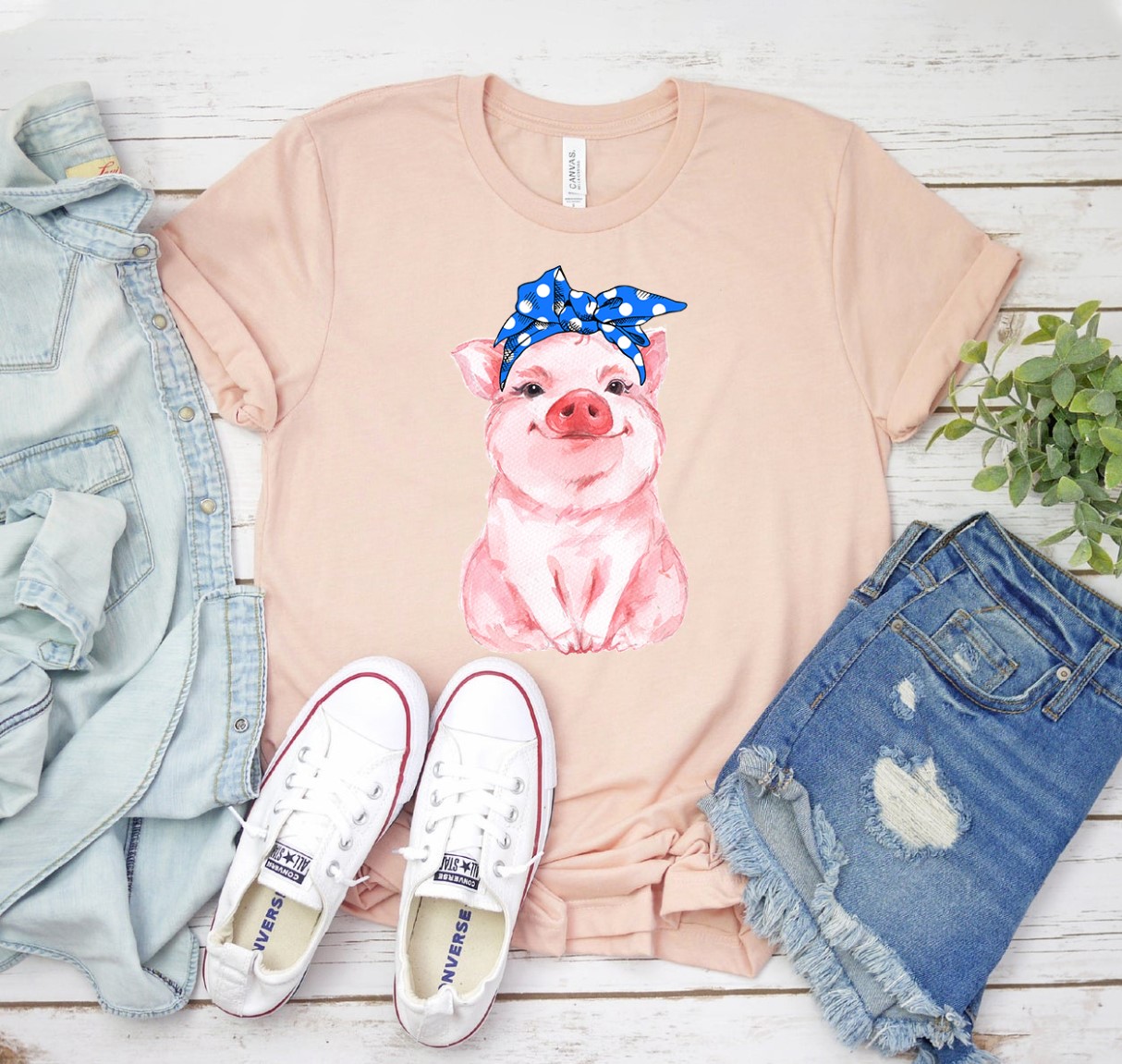 A stylish Pig Bandana T-shirt made from premium cotton, featuring a vibrant pig bandana graphic.