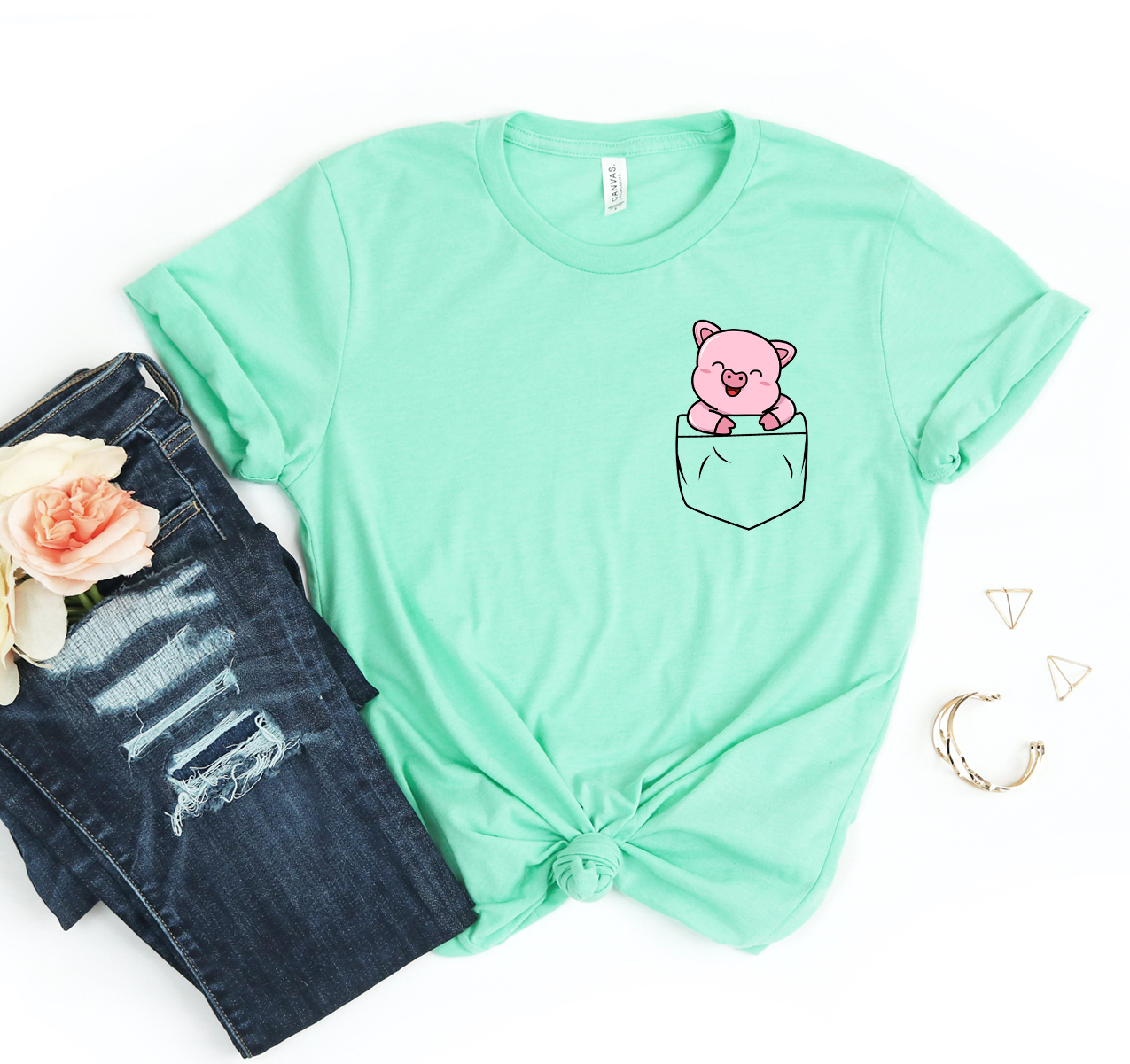 A stylish Pocket Pig T-shirt made from soft airlume cotton, featuring a classic unisex design suitable for all.