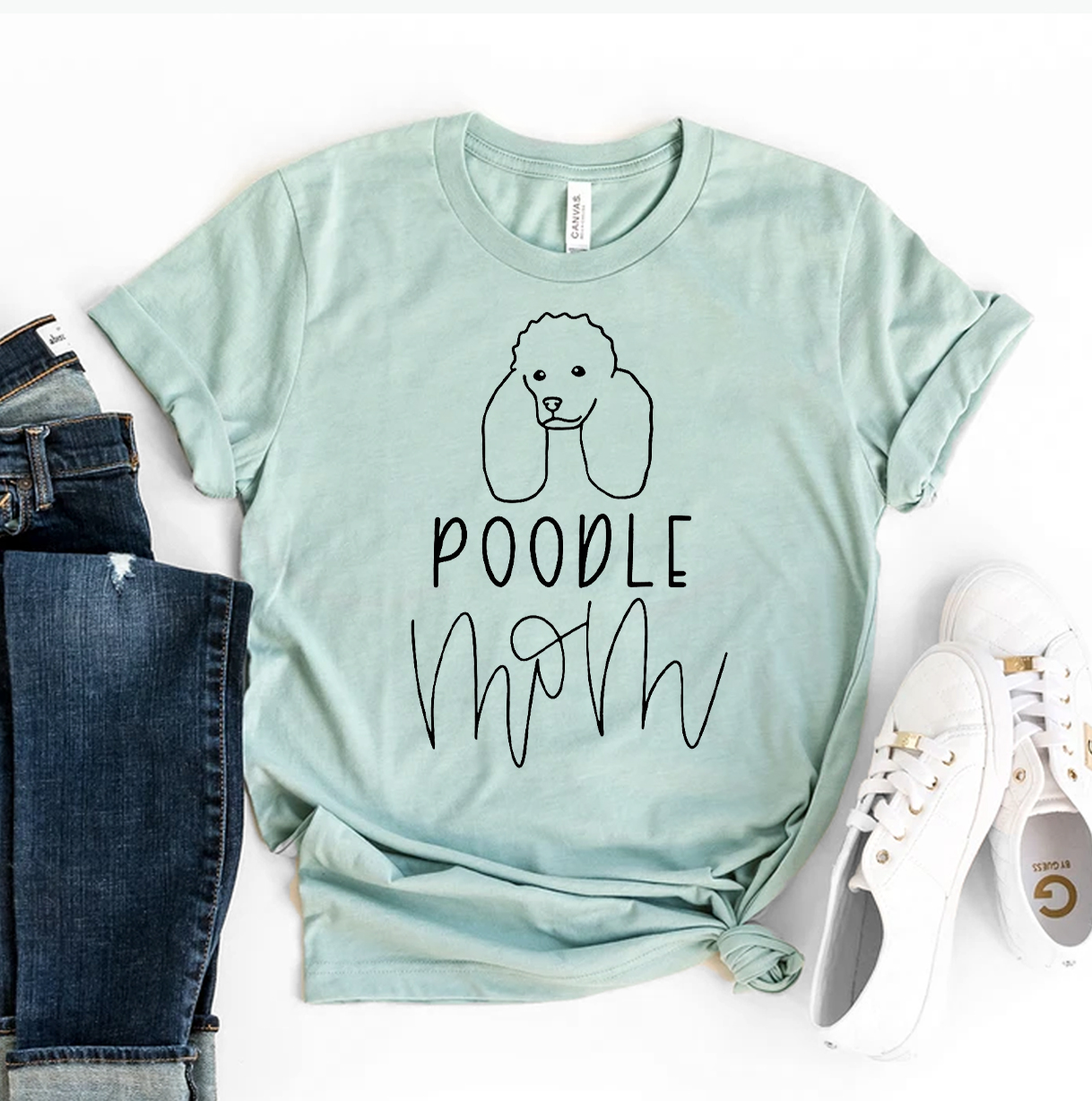 A stylish Poodle Mom T-shirt made of premium ring spun cotton, featuring a vibrant flex print design, available in various sizes.