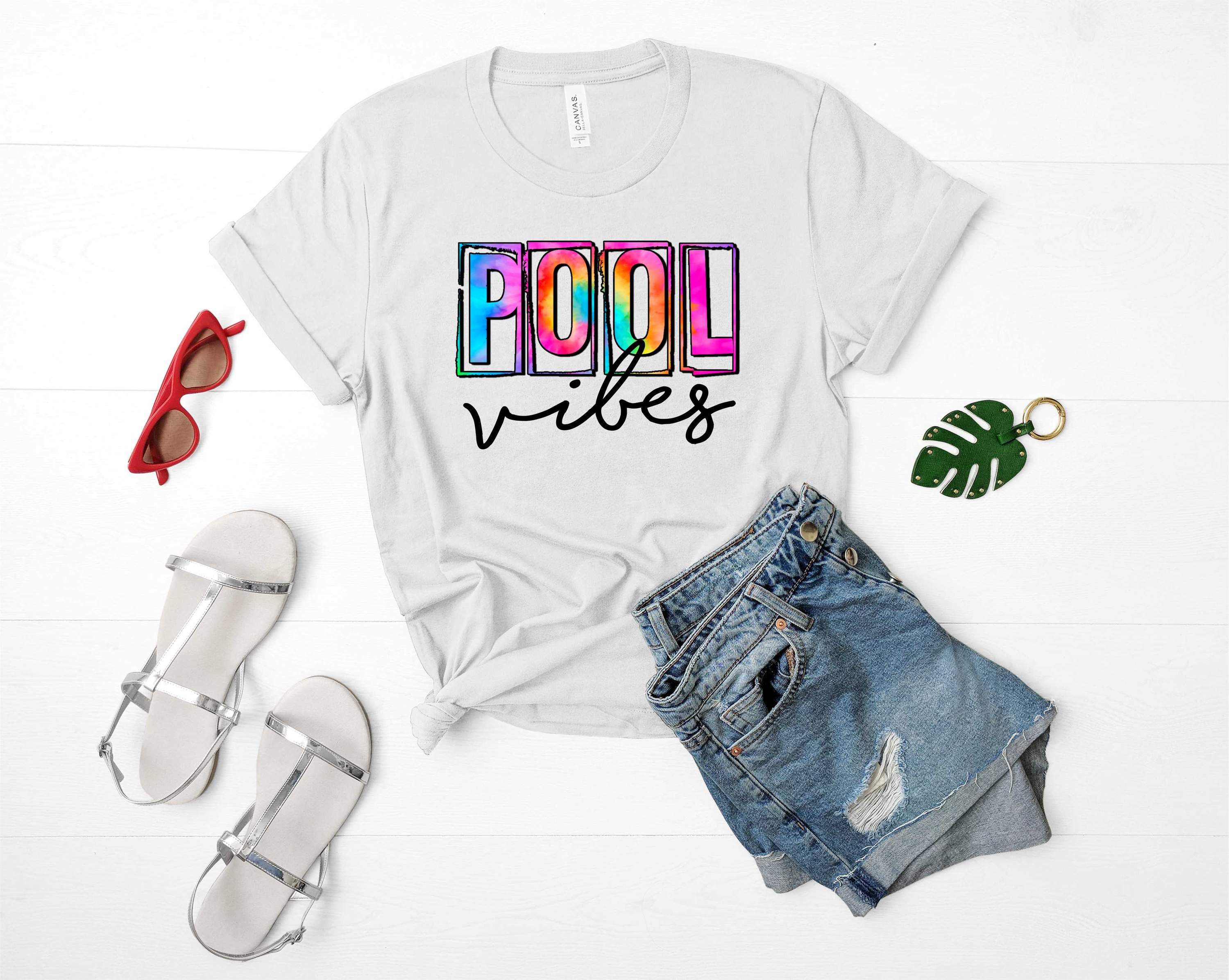 A vibrant unisex graphic tee featuring a fun pool vibes design, perfect for summer wear.