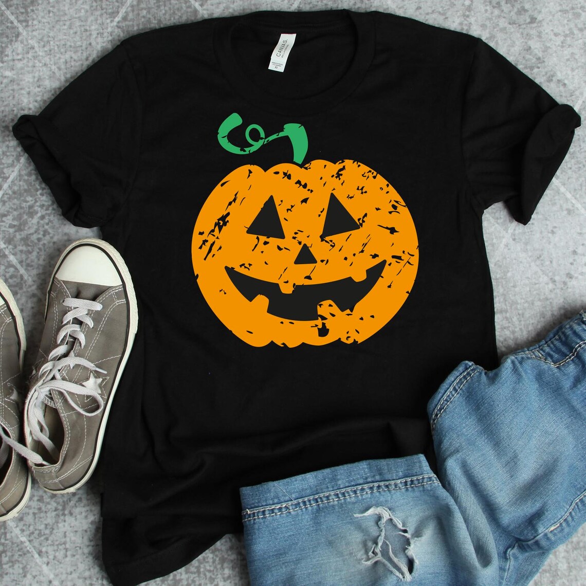 Pumpkin Halloween T-shirt featuring a vibrant pumpkin design on premium ring spun cotton fabric.