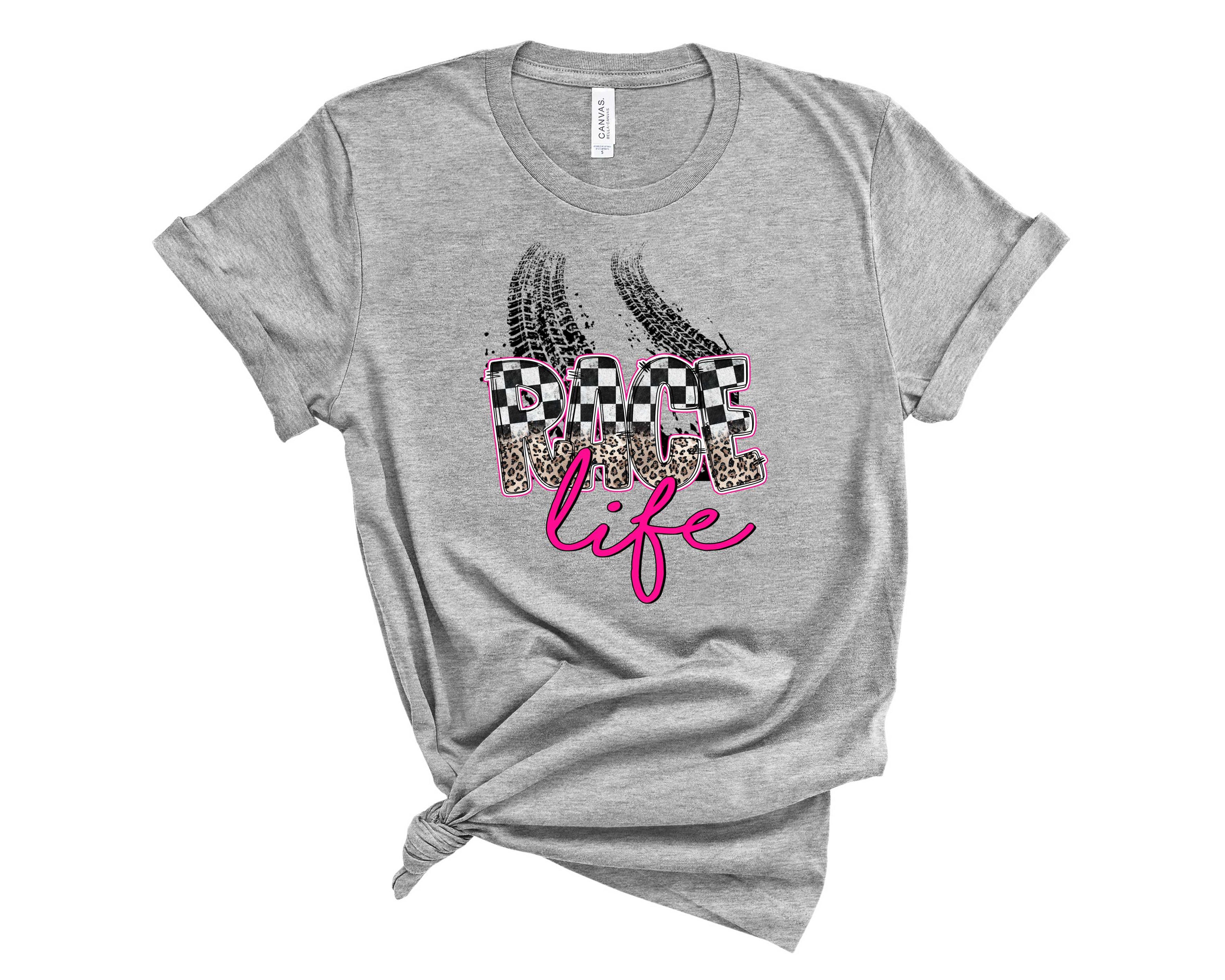 Race Life Pink Graphic Tee featuring a vibrant pink color and bold racing graphic design, suitable for all genders.