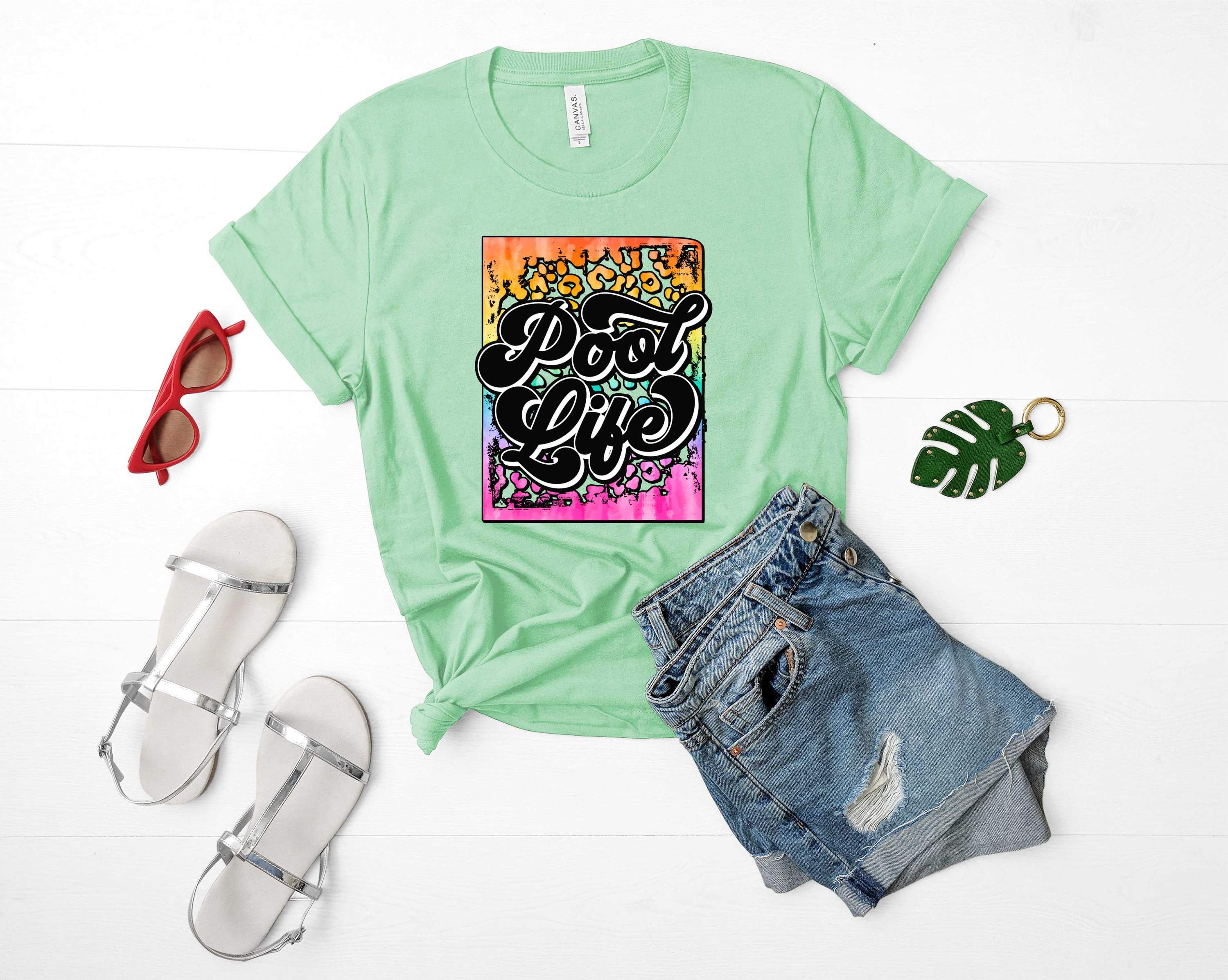 A vibrant unisex t-shirt featuring a colorful rainbow graphic, perfect for summer wear.