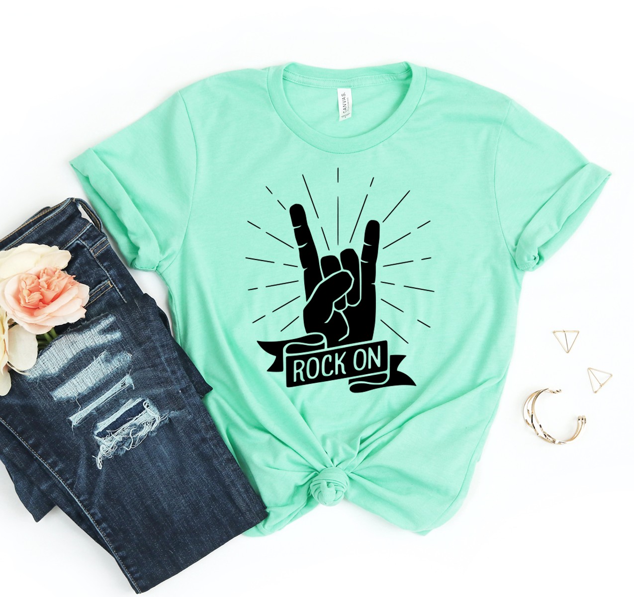 Rock On T-shirt in various sizes, showcasing its classic unisex design and soft fabric.