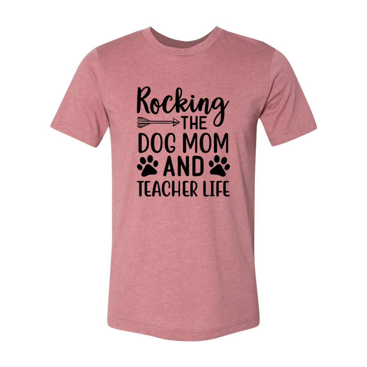 A stylish unisex T-shirt featuring the phrase 'Rocking The Dog Mom And Teacher Life' in vibrant print, available in multiple colors.