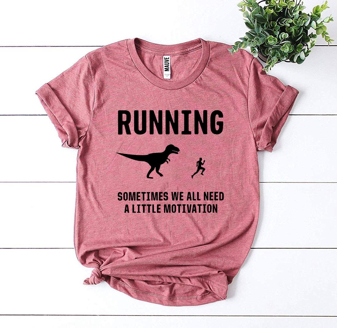 A soft, premium quality t-shirt featuring the motivational phrase 'Need a Little Motivation' designed for runners, available in various sizes.