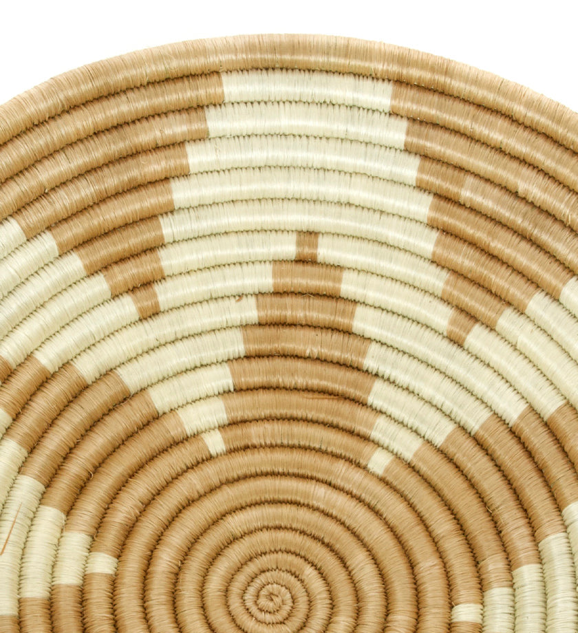 Handmade Rwanda star sisal basket, crafted from natural banana fiber and sisal, featuring intricate weaving patterns and a unique design.