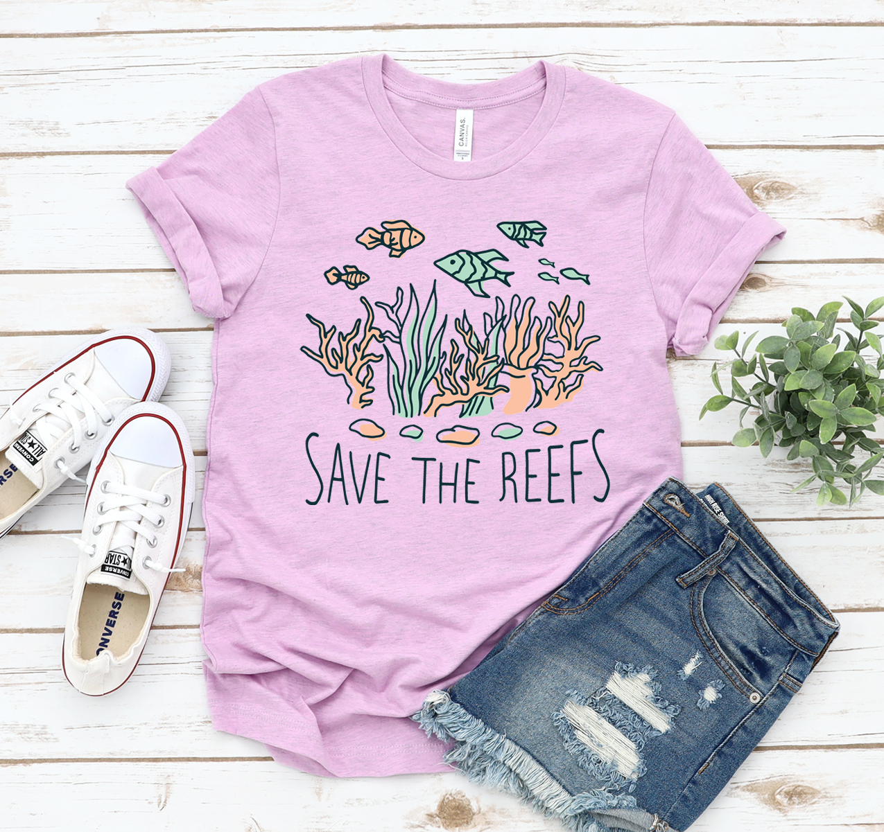 Save The Reefs T-shirt featuring a classic unisex design in soft airlume cotton, available in various sizes.