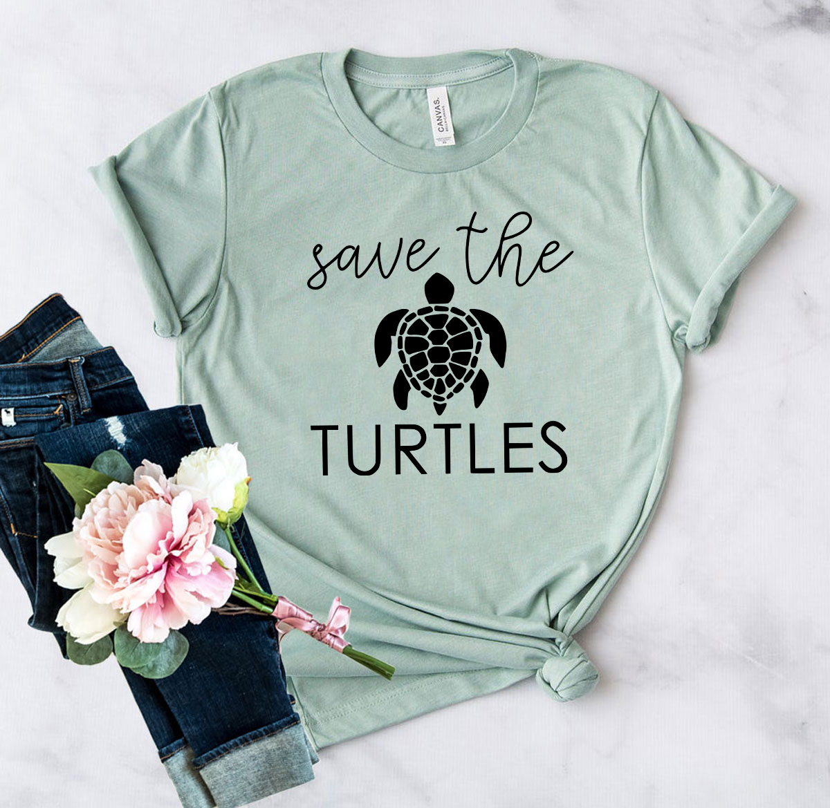 A stylish unisex Save The Turtles Shirt made from soft ring spun cotton, featuring a vibrant turtle graphic.