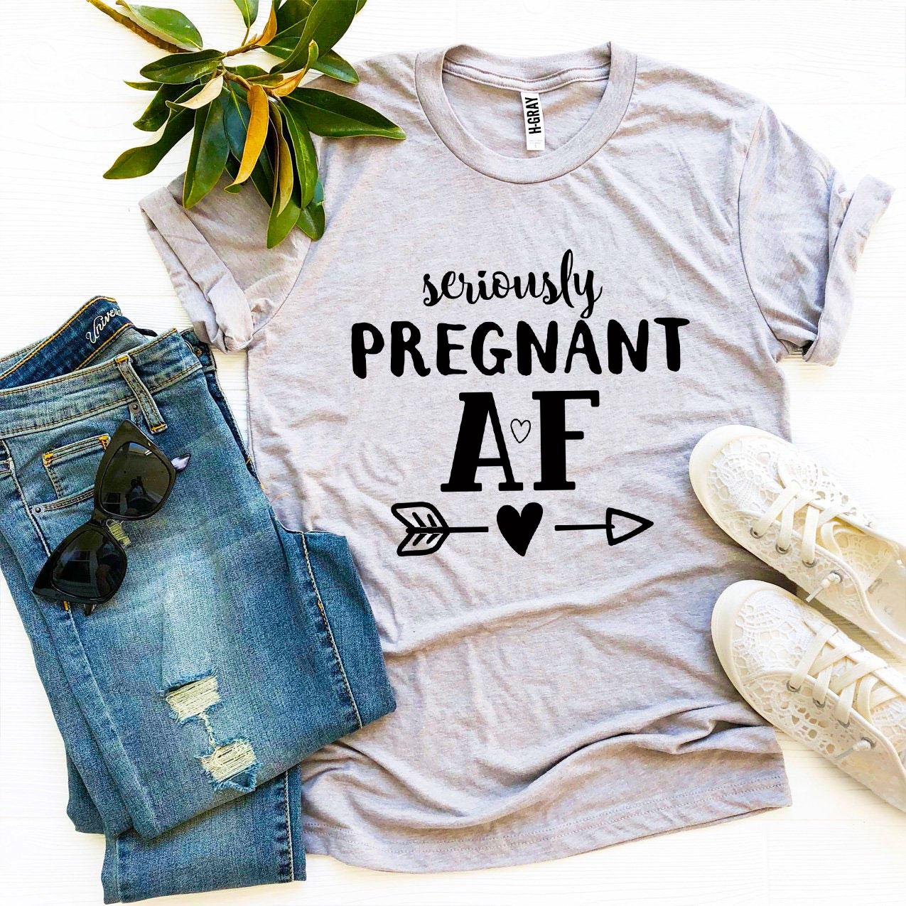 Seriously Pregnant AF T-shirt made of premium ring spun cotton, featuring a humorous design and available in various sizes.